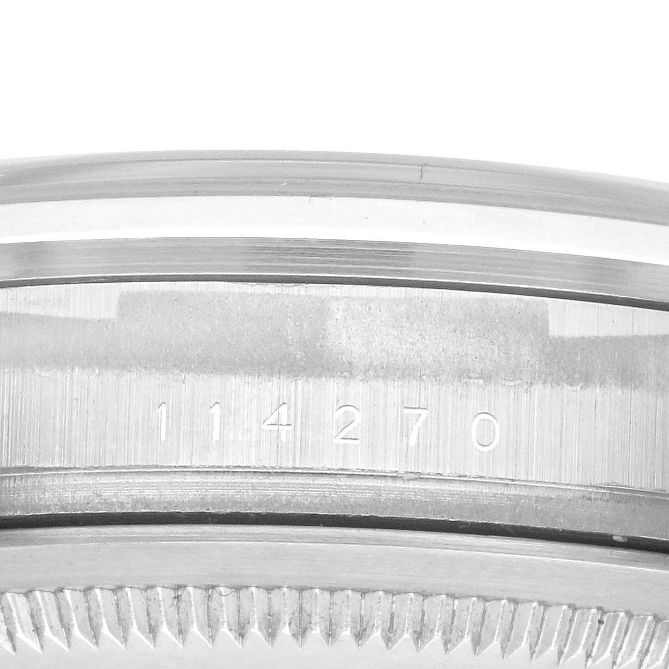 The image shows a close-up of the case side and model number (114270) of a Rolex Explorer 114270 Men
s Stainless Steel Black Dial 114270 Men
s Stainless Steel Black Dial watch.
