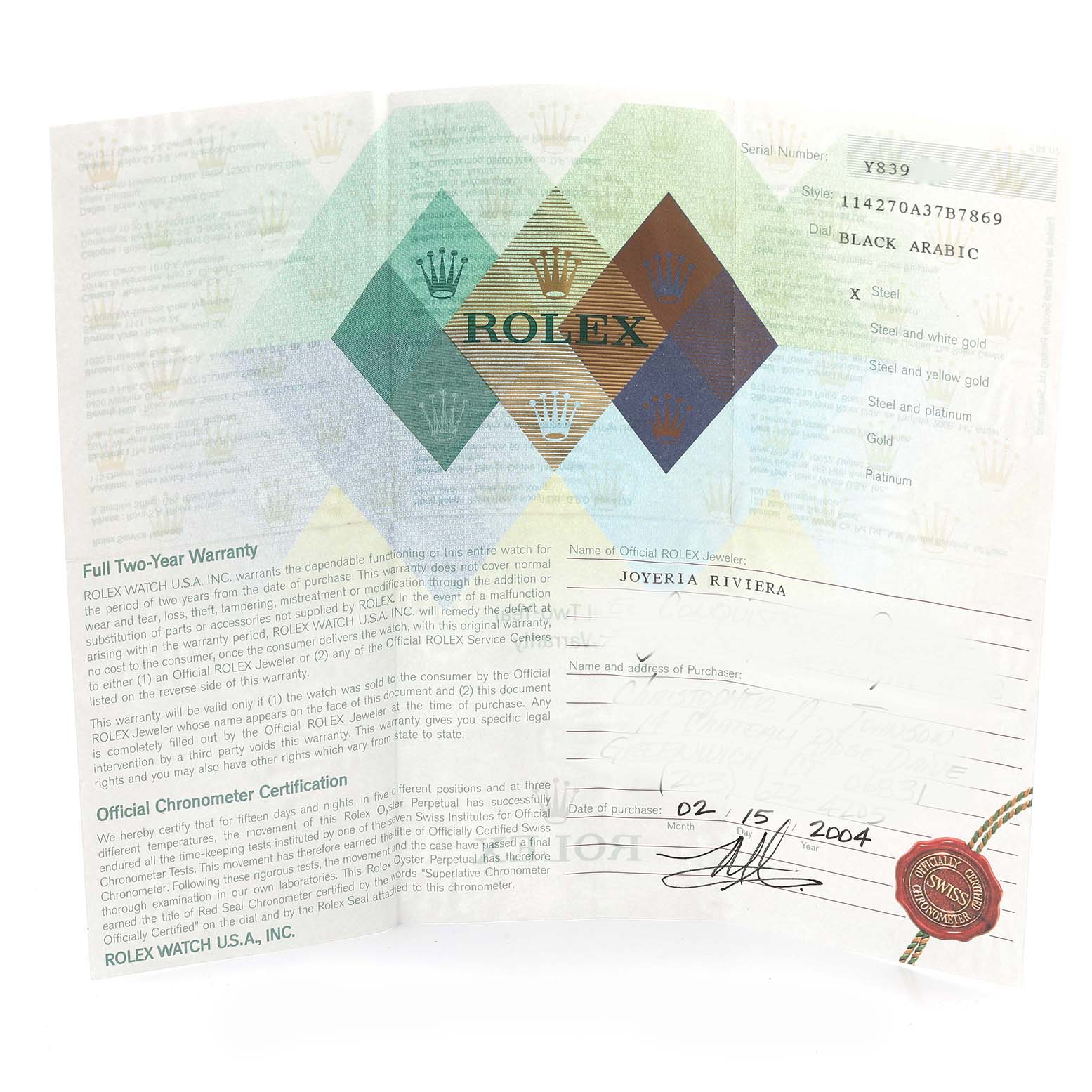 The image shows the warranty card and certificate for a Rolex Explorer 114270 Men
s Stainless Steel Black Dial 114270 Men
s Stainless Steel Black Dial watch.