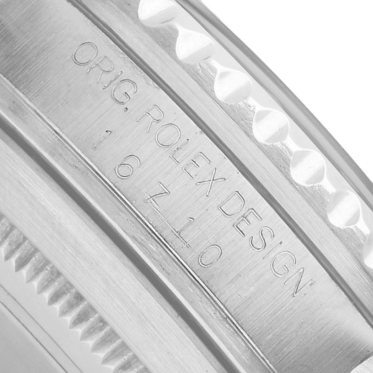The image shows a close-up of the case back engraving on a Rolex GMT-Master 16710 Men's Stainless Steel Black Dial, displaying "ORIG. ROLEX DESIGN 16710".