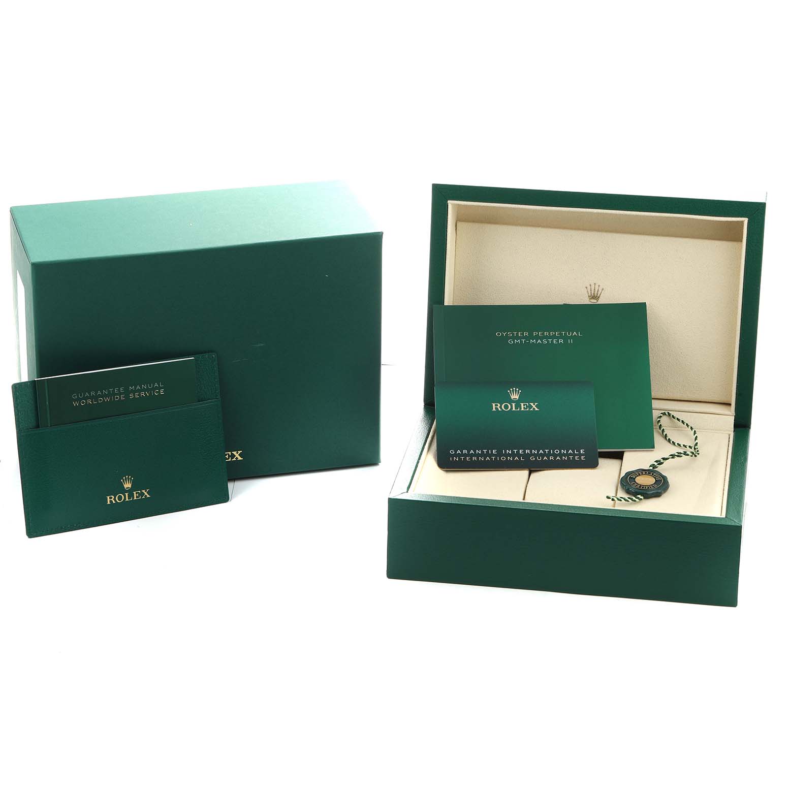 The image shows the packaging and accessories for a Rolex GMT-Master 126713 Men's Steel and Gold (two tone) Black Dial, including a green box, booklets, and a tag inside the open box.
