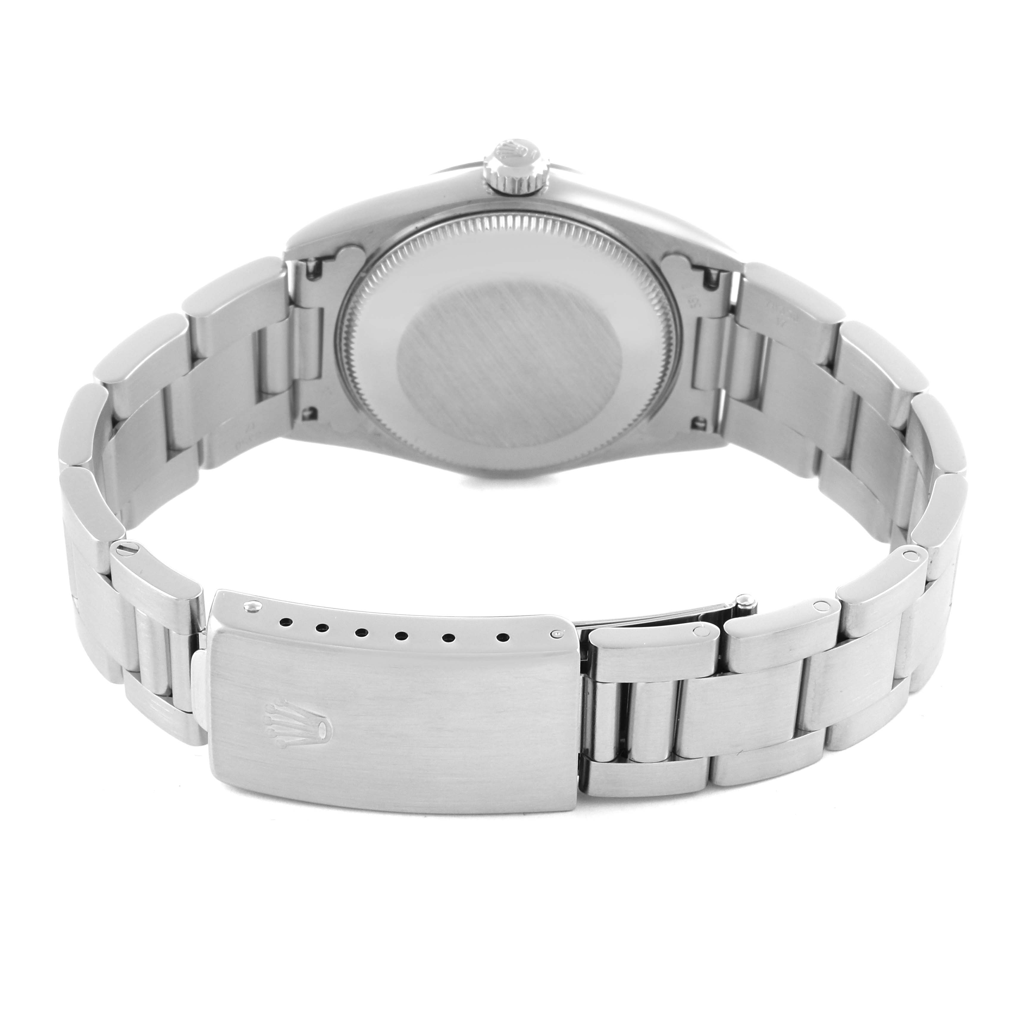 The Rolex Mid-Size 77080 Women's Stainless Steel Pink Dial 77080 Women's Stainless Steel Pink Dial watch is shown from the back, featuring the case back, clasp, and bracelet.