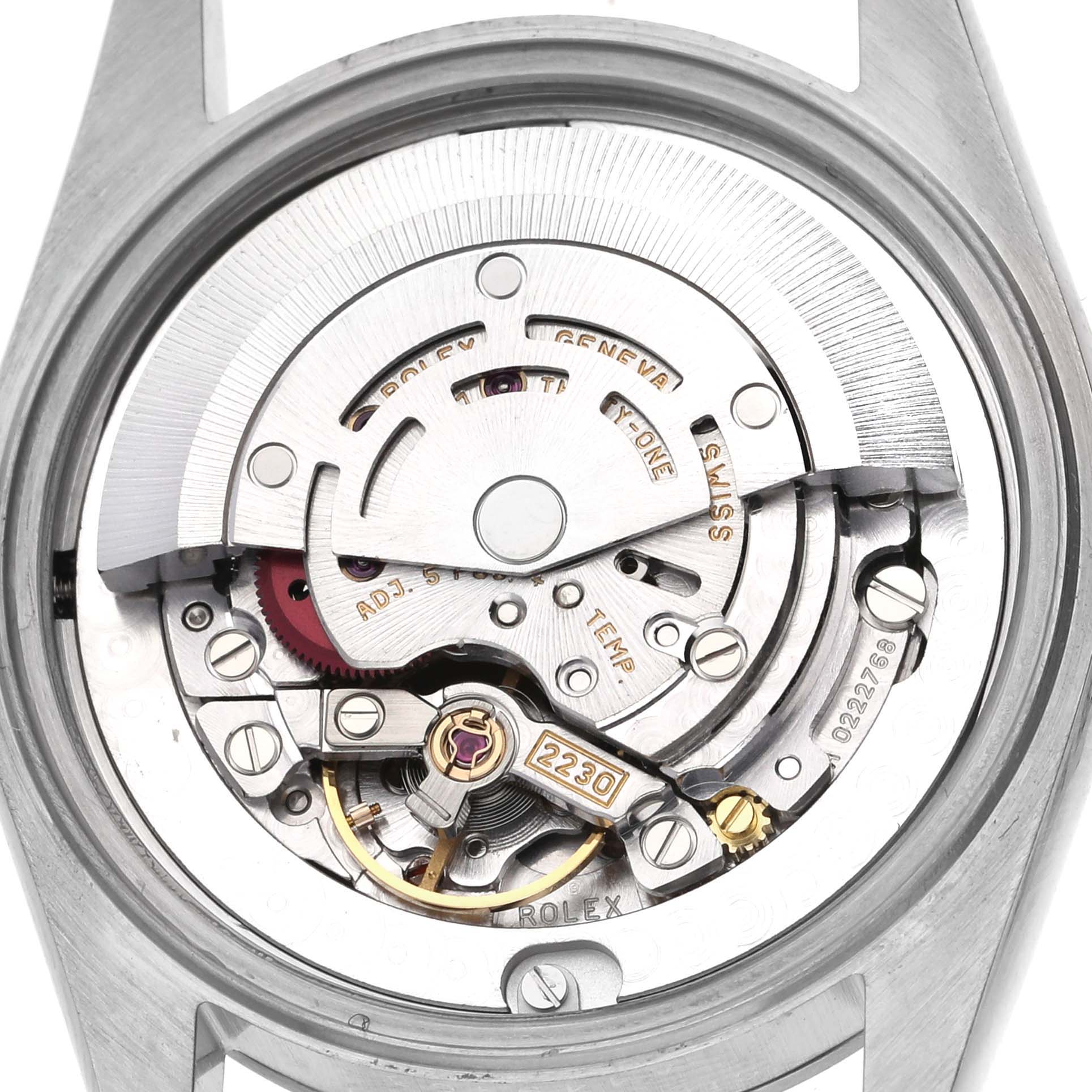 The image shows the internal mechanism of a Rolex Mid-Size 77080 Women's Stainless Steel Pink Dial 77080 Women's Stainless Steel Pink Dial watch from the back.