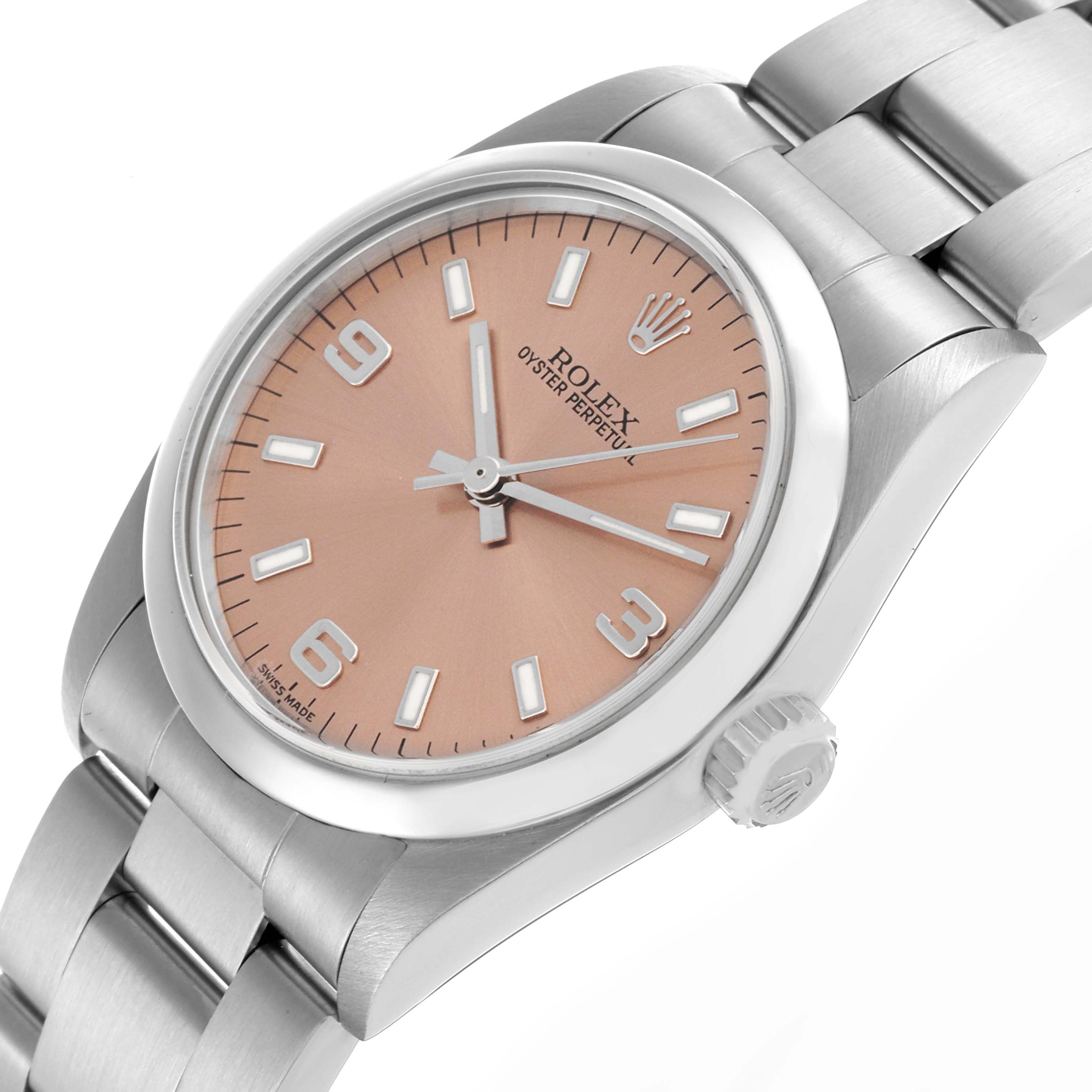 The Rolex Oyster Perpetual Mid-Size watch is shown at an angle displaying the dial, crown, and part of the bracelet.