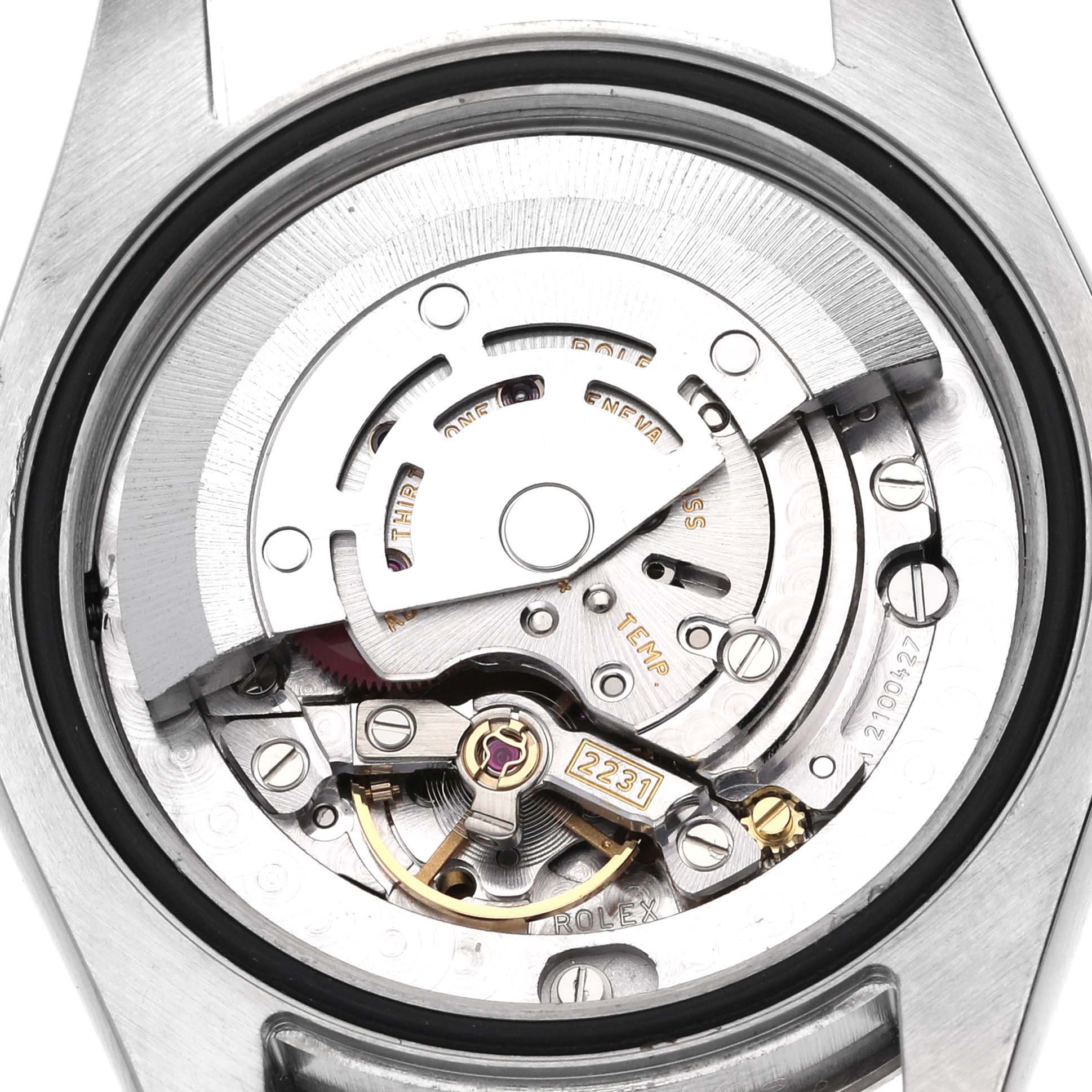 This image shows the internal mechanical movement of a Rolex Mid-Size 177234 Women
s Stainless Steel Blue Dial 177234 Women
s Stainless Steel Blue Dial watch from a close-up angle.