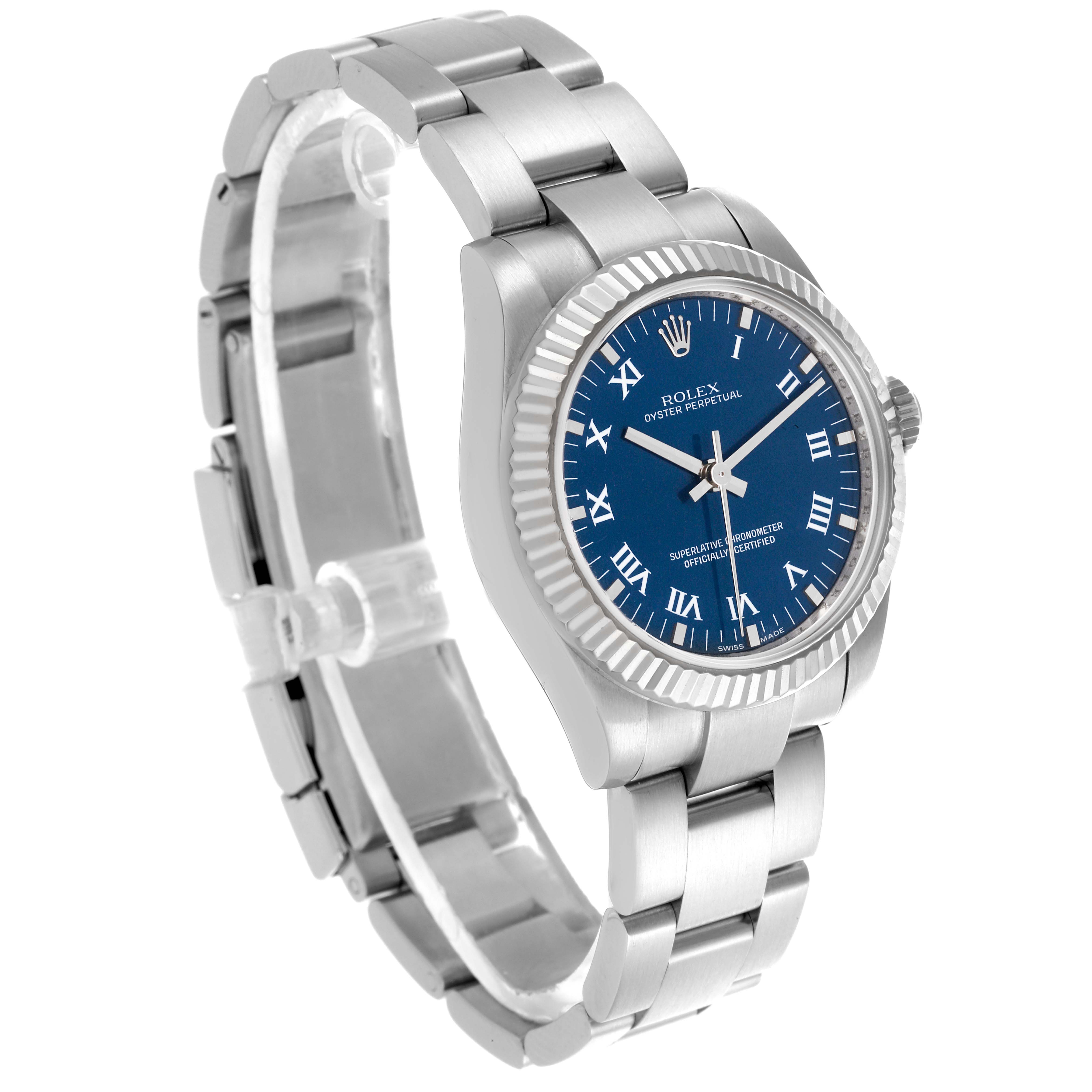 The Rolex Mid-Size 177234 Women
s Stainless Steel Blue Dial 177234 Women
s Stainless Steel Blue Dial watch is shown at a tilted angle, highlighting the blue face, Roman numerals, bezel, and metal bracelet.