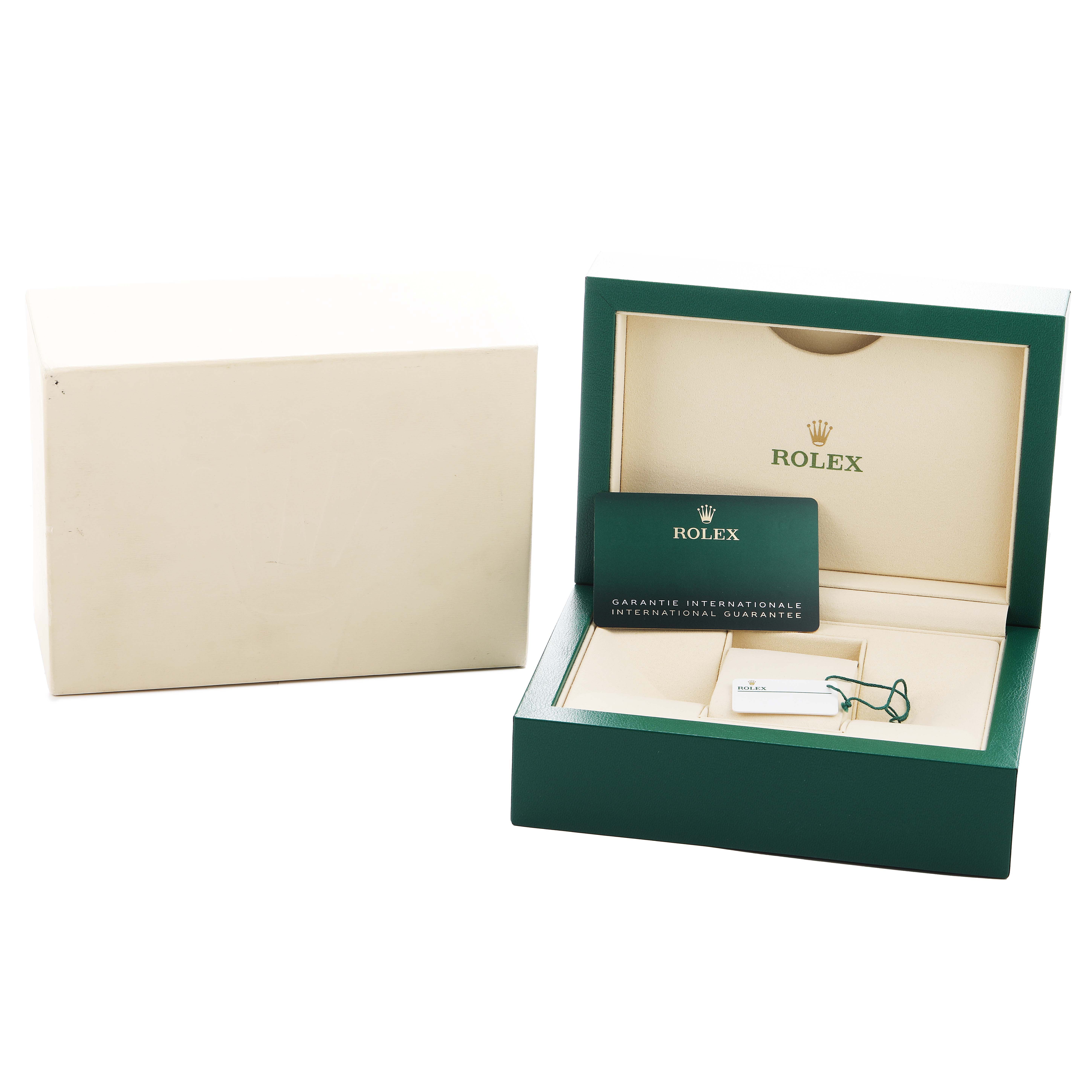 The image shows the open box and international guarantee card for a Rolex Mid-Size 277200 Women's Stainless Steel Green Dial model.