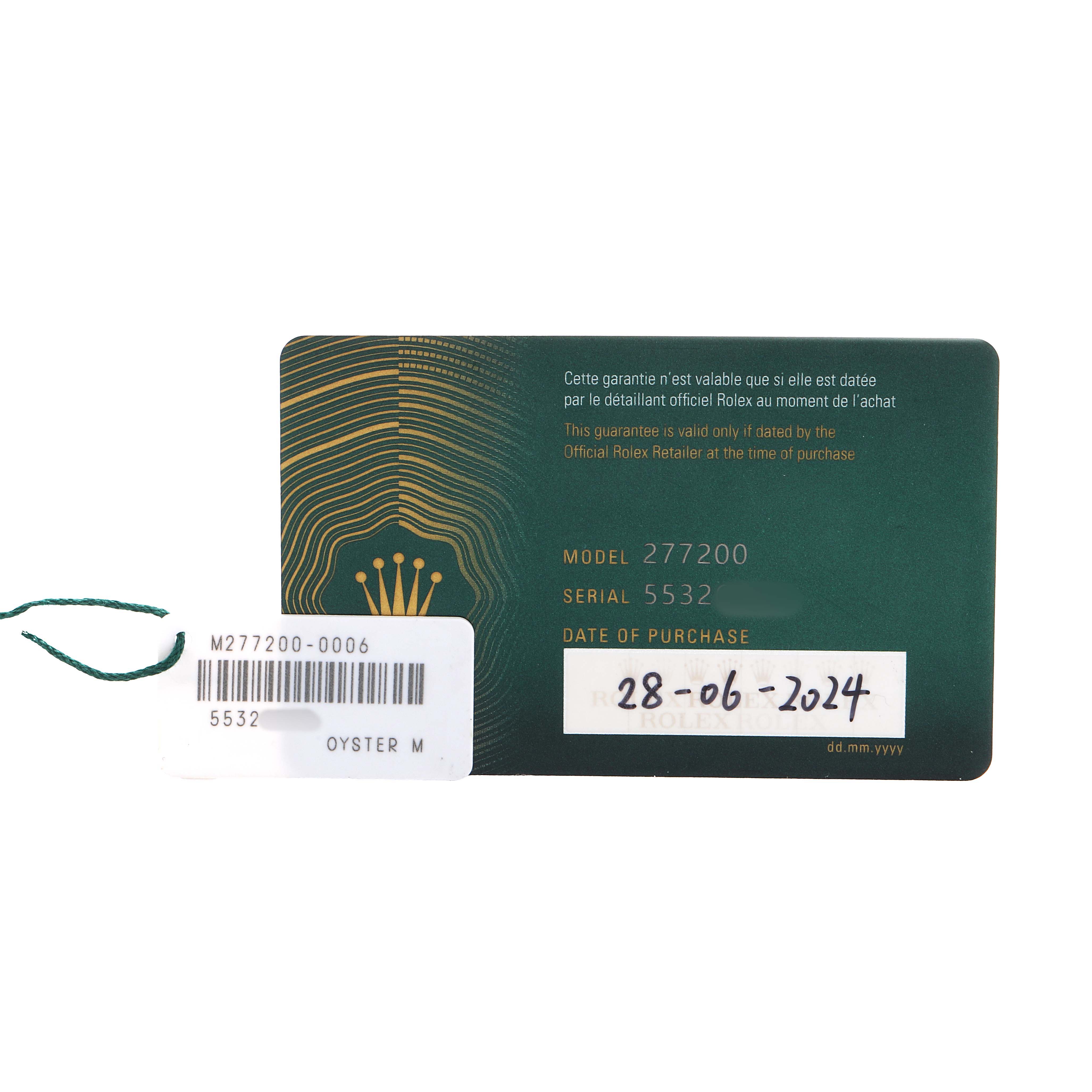 The image shows a warranty card and tag for a Rolex Mid-Size 277200 Women's Stainless Steel Green Dial model 277200.