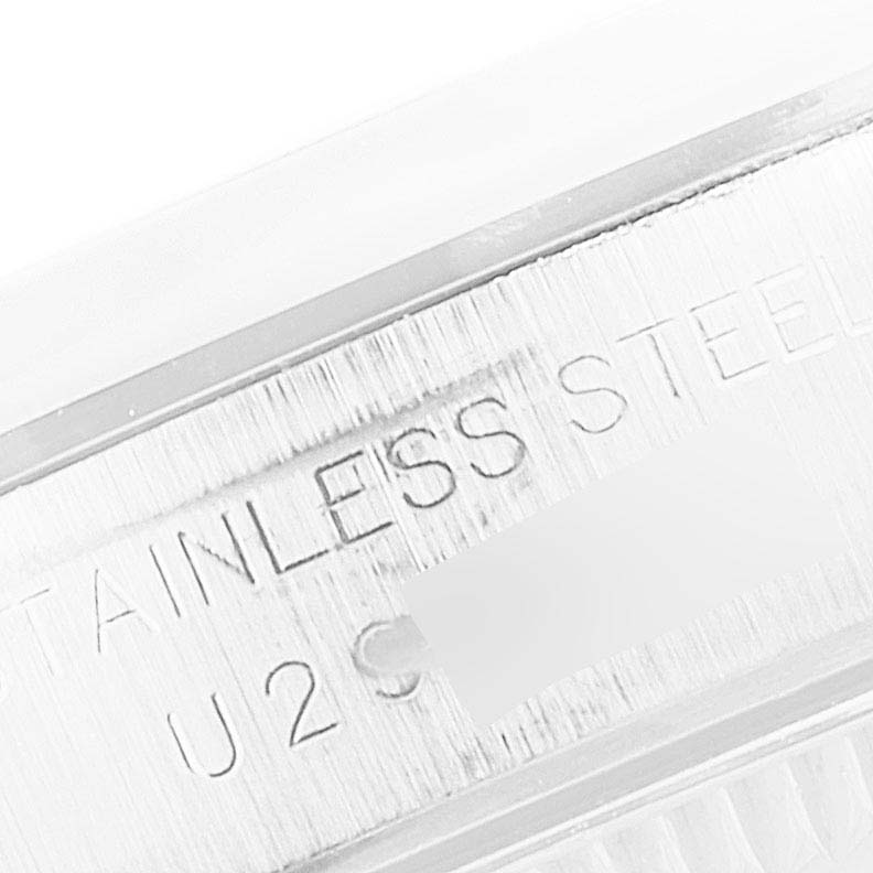 This close-up image displays the side of a Rolex Oyster Perpetual 67180 Women's Stainless Steel Pink Dial 67180 Women's Stainless Steel Pink Dial watch, showcasing its stainless steel material.