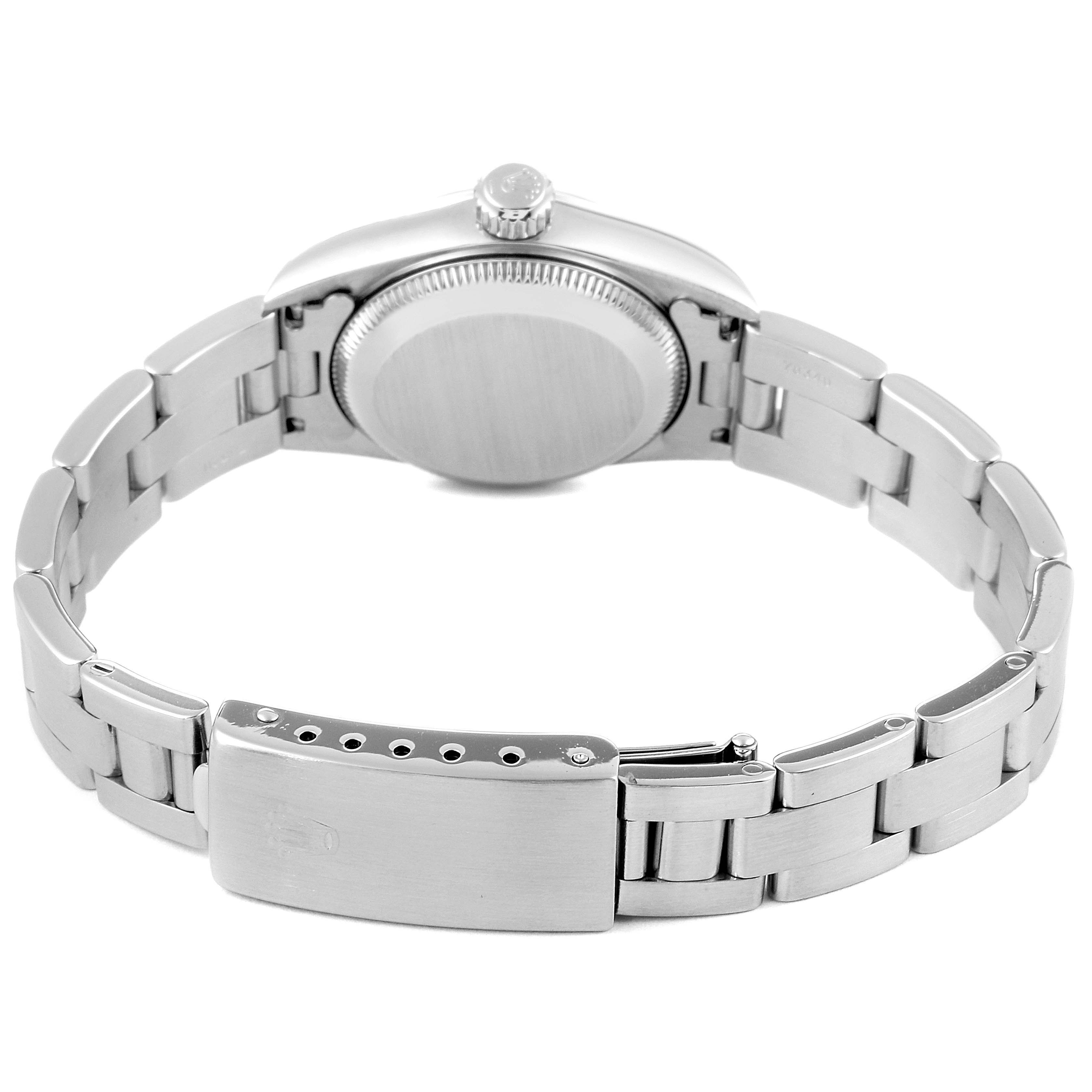 The image shows the back view of a Rolex Oyster Perpetual 67180 Women's Stainless Steel Pink Dial 67180 Women's Stainless Steel Pink Dial watch, highlighting the case back and bracelet with the clasp.