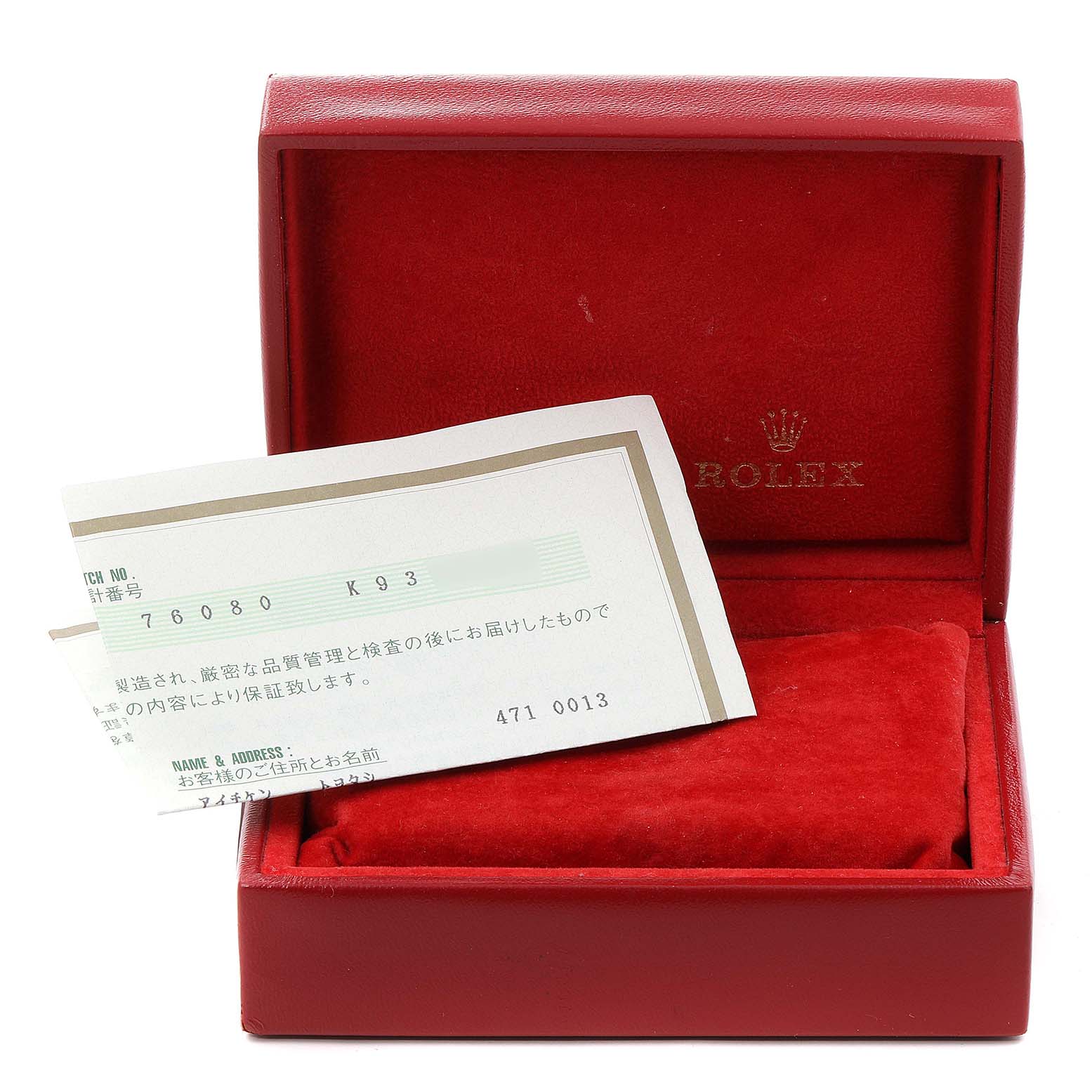 The image shows an empty red Rolex box and a warranty card for the Oyster Perpetual model.