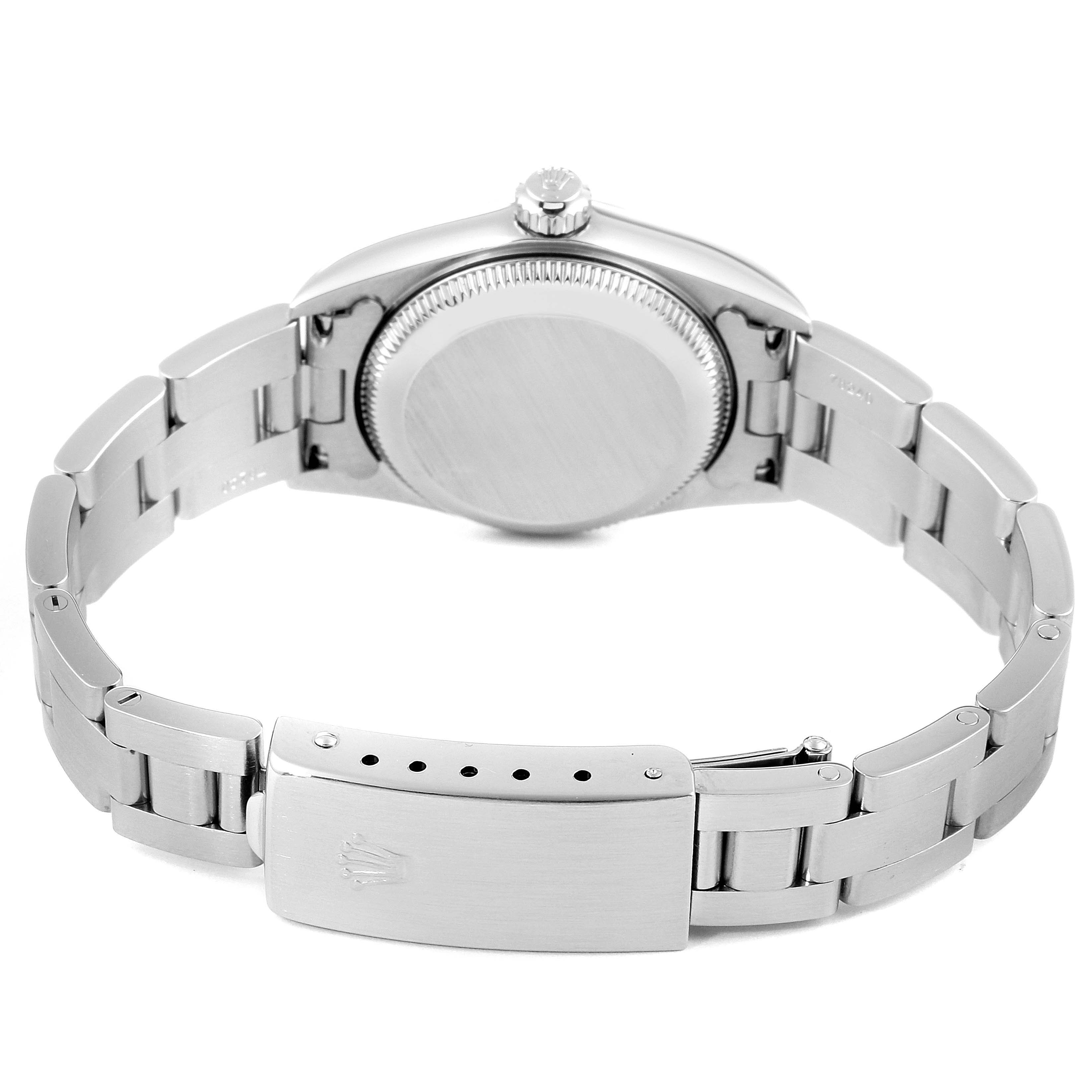 The image shows the back view of a Rolex Oyster Perpetual 76080 Women's Stainless Steel White Dial 76080 Women's Stainless Steel White Dial watch, highlighting the bracelet and clasp.