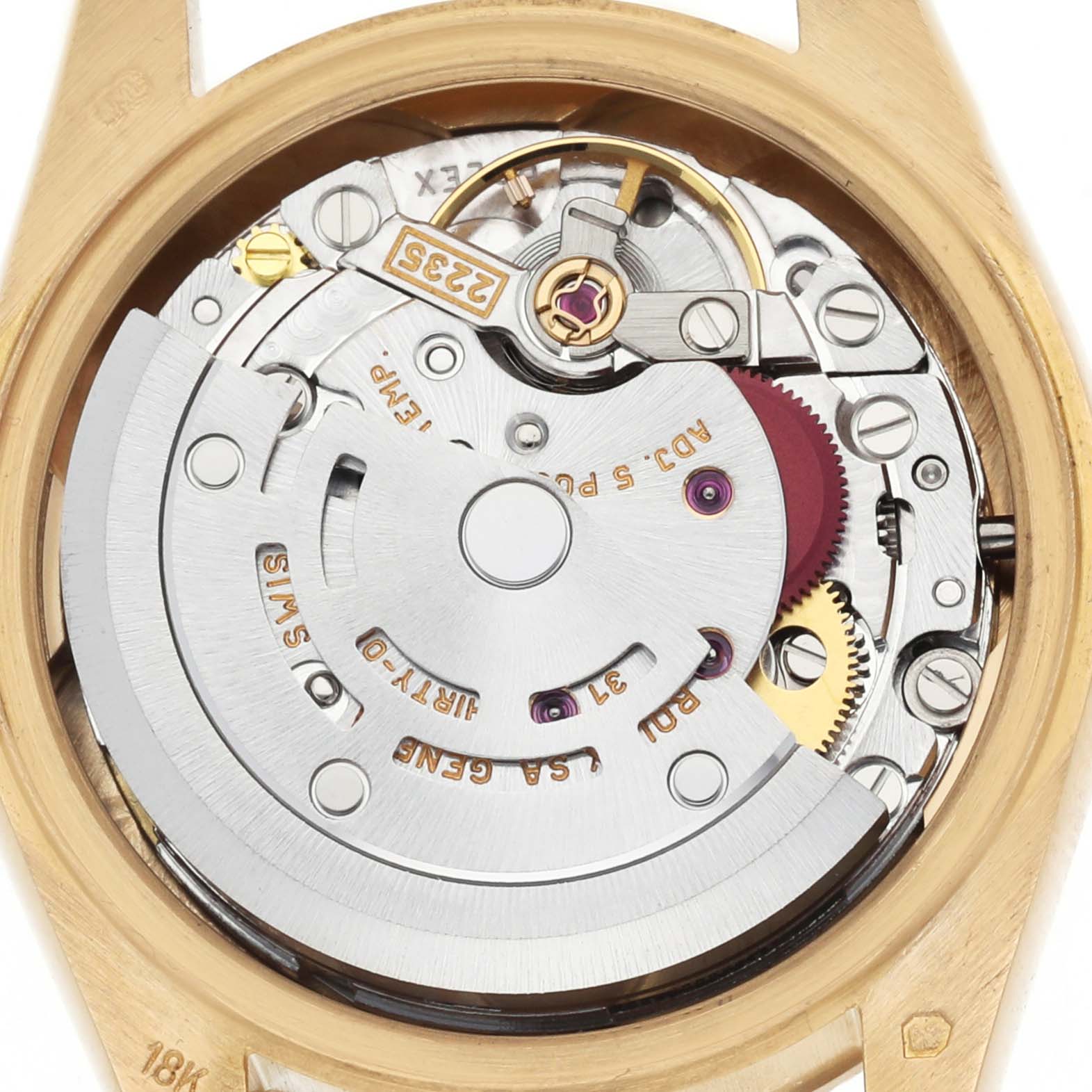 The image shows the movement of a Rolex President 179178 Women's Yellow Gold Champagne Dial watch from a top-down angle, highlighting the intricate mechanisms.