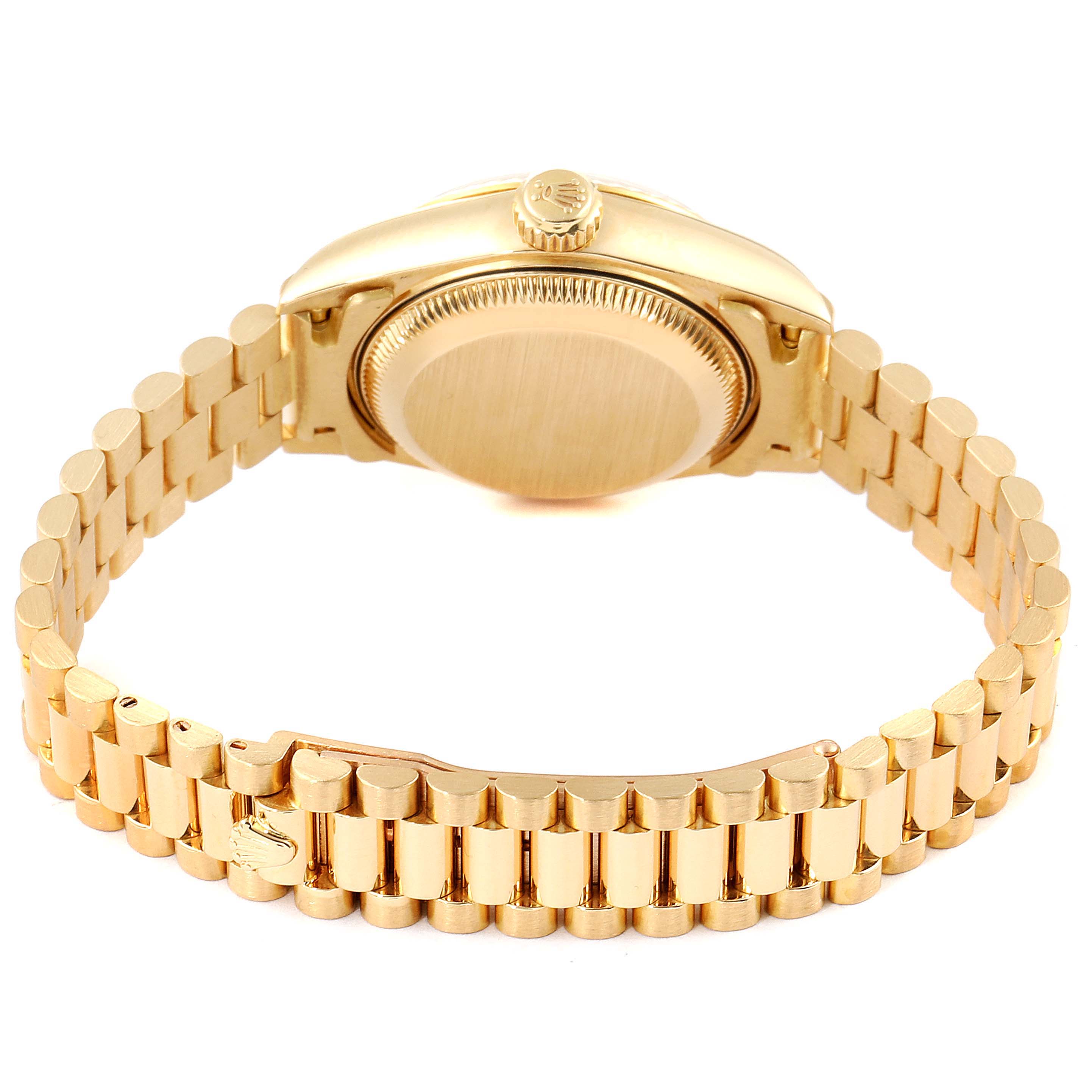 This image shows the backside and bracelet of the Rolex President 79178 Women
s Yellow Gold Champagne Dial 79178 Women
s Yellow Gold Champagne Dial model watch at an angle, highlighting the case back and crown.