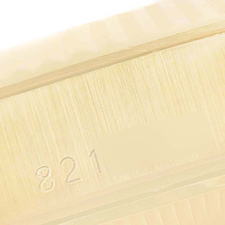 The image shows a close-up of the caseback with engravings on the Rolex President 69178 Women
s Yellow Gold Champagne Dial 69178 Women
s Yellow Gold Champagne Dial model watch.