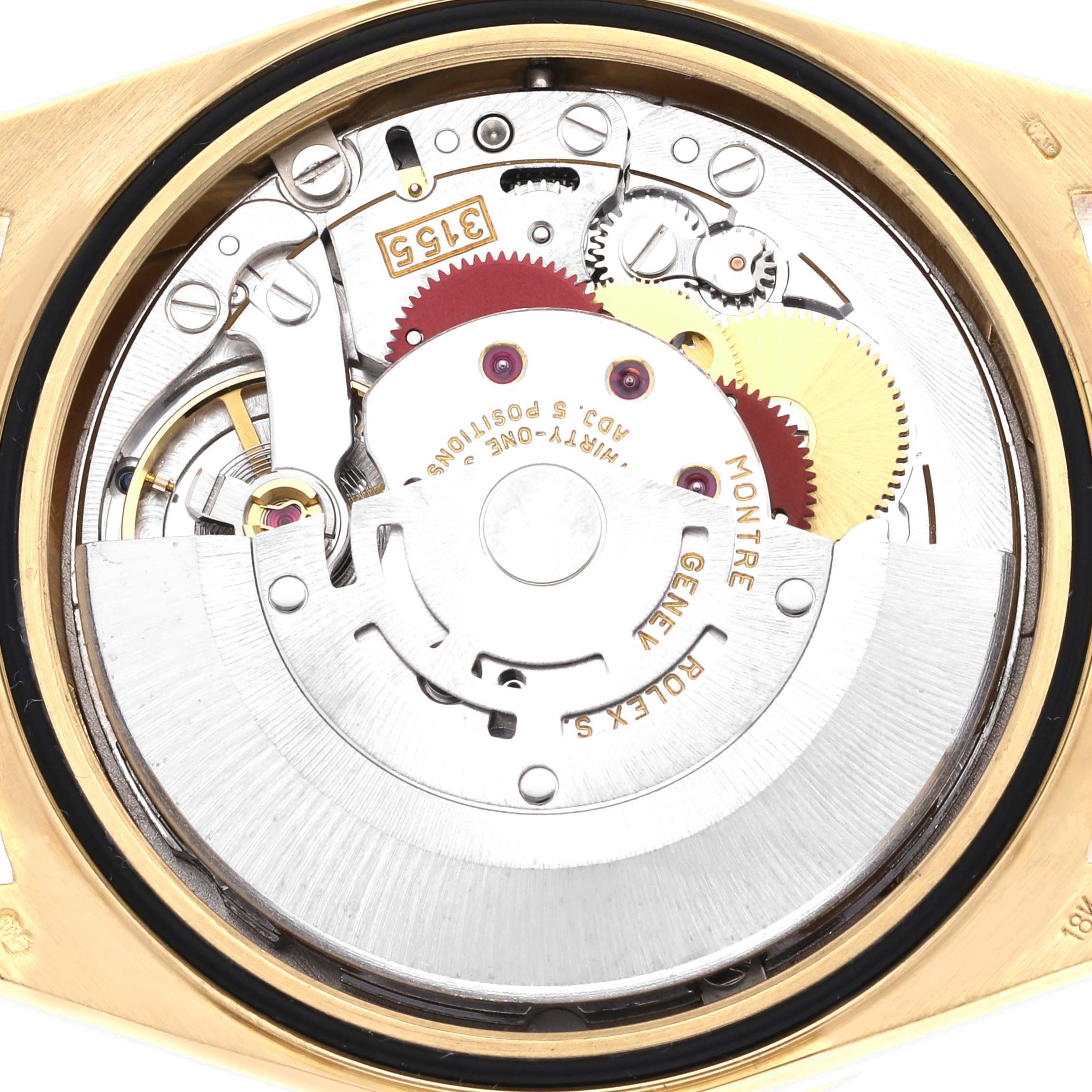 The image shows the internal mechanism of a Rolex President 18348 Men
s Yellow Gold Champagne Dial 18348 Men
s Yellow Gold Champagne Dial watch, viewed from the back showcasing gears and movement parts.