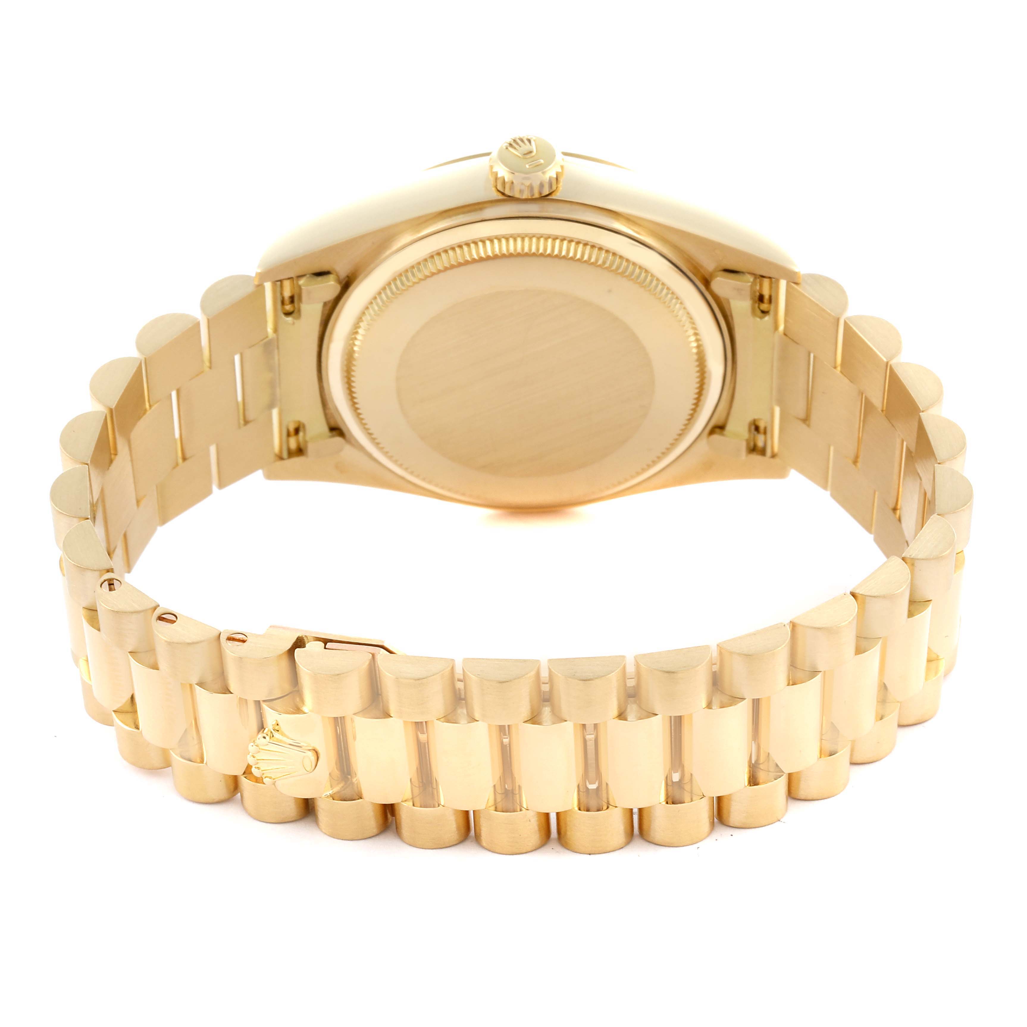 The Rolex President 18038 Men
s Yellow Gold Champagne Dial 18038 Men
s Yellow Gold Champagne Dial watch is shown from the back, highlighting the clasp and bracelet.