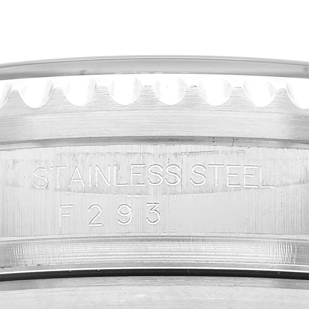 The image shows a close-up of the case back engraving and bezel edge of the Rolex Sea-Dweller 16600T Men's Stainless Steel Black Dial 16600T Men's Stainless Steel Black Dial watch.