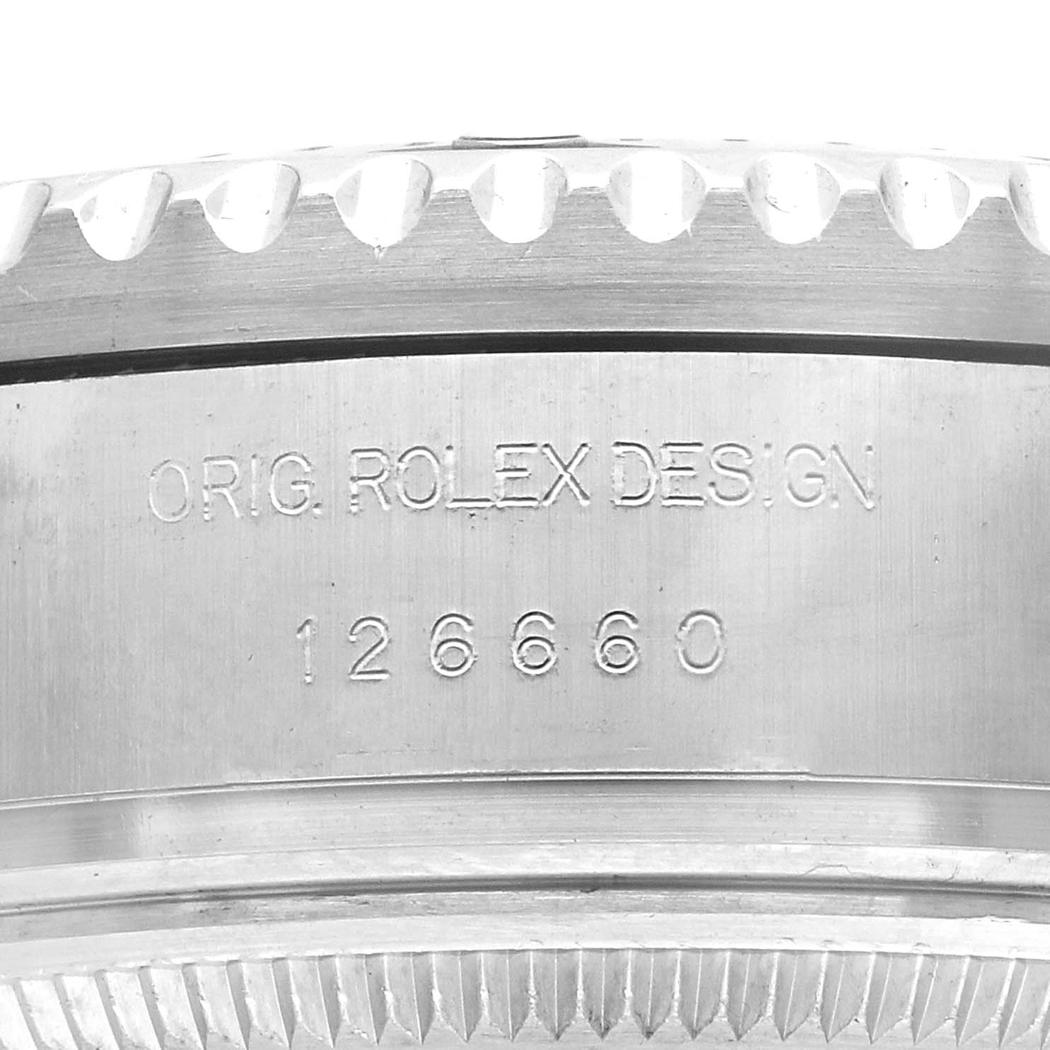The image shows a close-up of the side of the Rolex Sea-Dweller 126660 Men's Stainless Steel Blue Dial case, highlighting the model number "126660" and engraved markings.