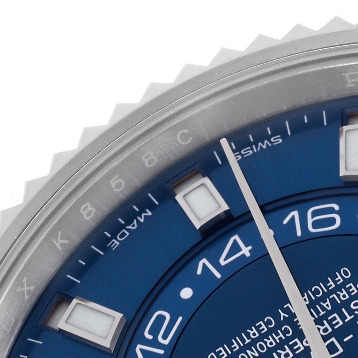 The image shows a close-up of the Rolex Sky-Dweller 326934 Men
s Stainless Steel Blue Dial 326934 Men
s Stainless Steel Blue Dial
s blue dial and part of the fluted bezel.