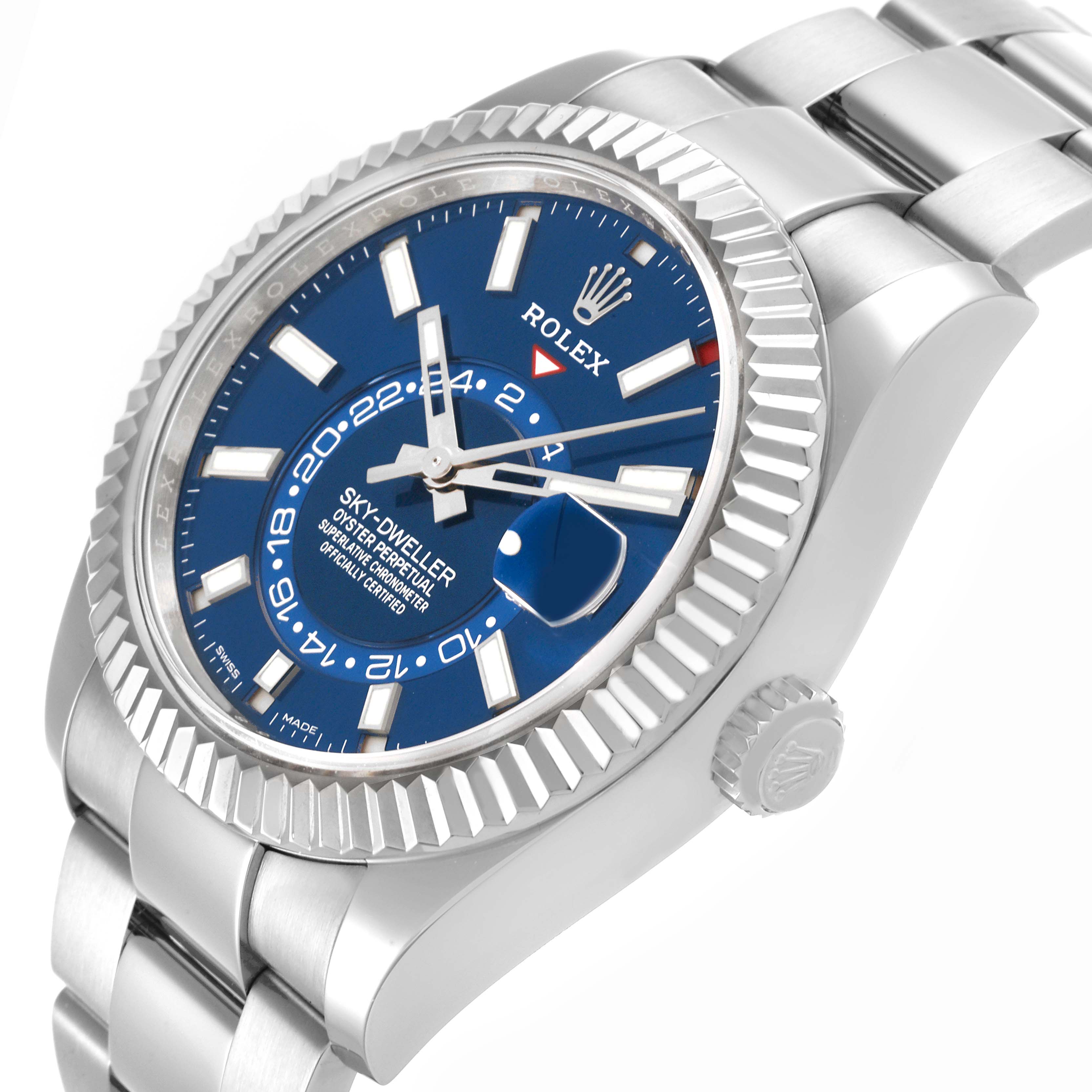 The Rolex Sky-Dweller 326934 Men
s Stainless Steel Blue Dial 326934 Men
s Stainless Steel Blue Dial watch is shown at a slight angle, highlighting the blue dial, fluted bezel, and part of the bracelet.