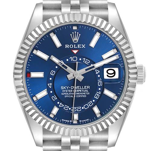 The Rolex Sky-Dweller watch is shown from a front angle, displaying the blue dial, bezel, and part of the bracelet.