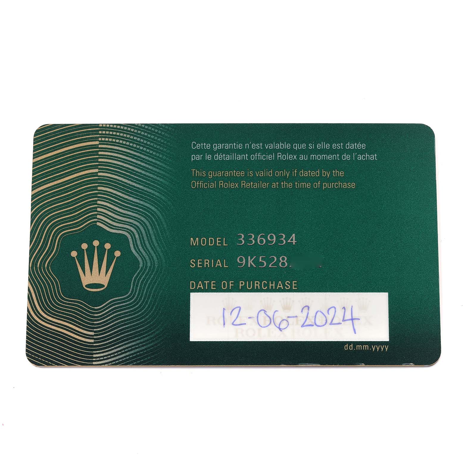 This image shows a Rolex Sky-Dweller 336934 Men
s Stainless Steel Blue Dial 336934 Men
s Stainless Steel Blue Dial warranty card with model and serial numbers.