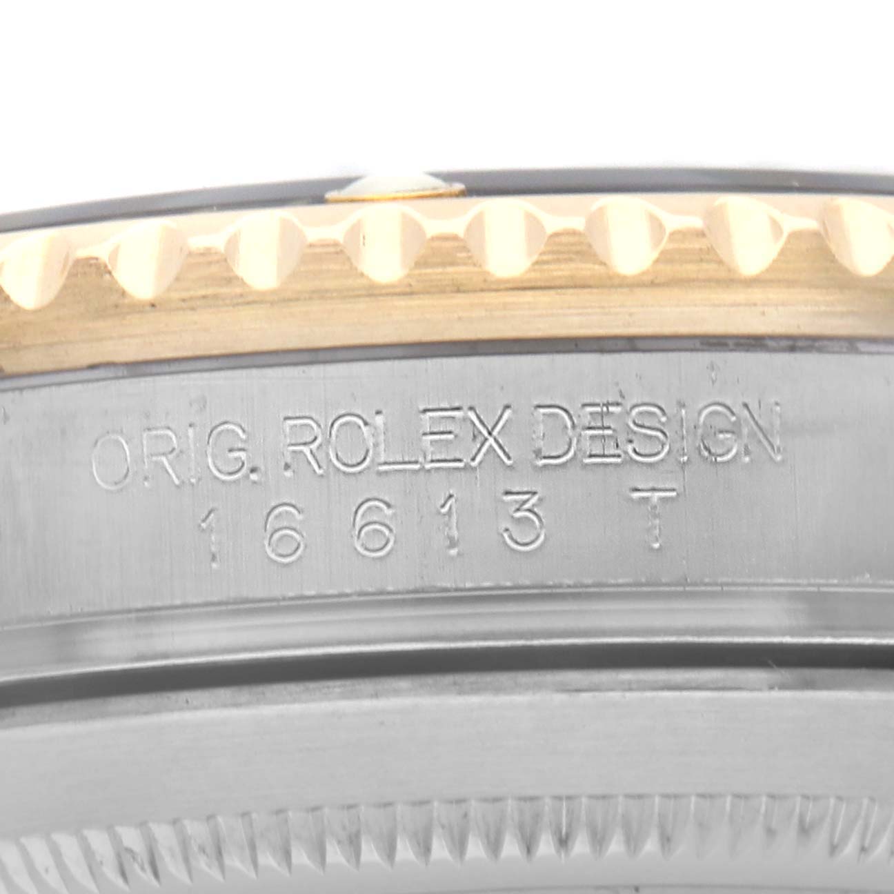 This close-up angle shows the case side of a Rolex Submariner 16613 Men's Steel and Gold (two tone) Black Dial, highlighting the model engraving "16613 T."