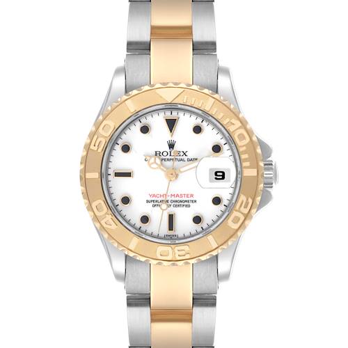 The Rolex Yacht-Master watch is shown from a top-down angle, highlighting the dial, bezel, and bracelet.