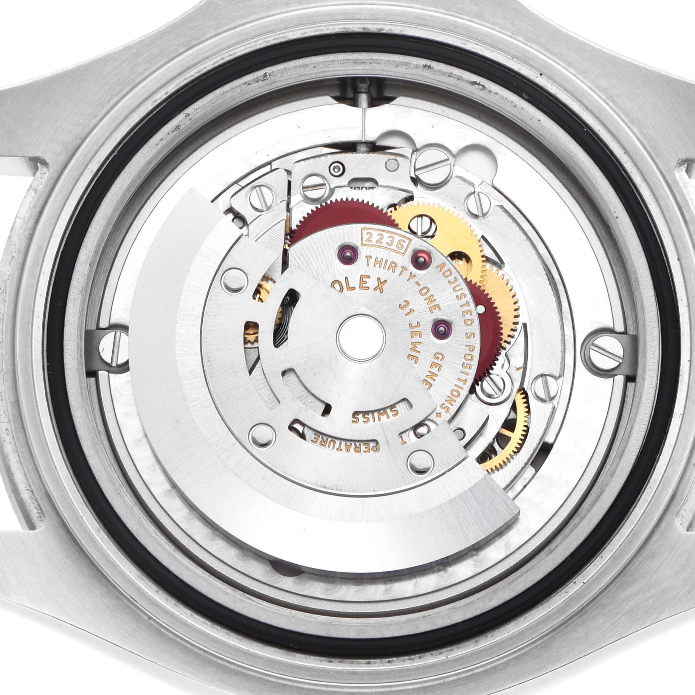 The image shows the internal movement of a Rolex Yacht-Master 268622 Men's Stainless Steel Grey Dial, showcasing gears and components from a top-down angle.