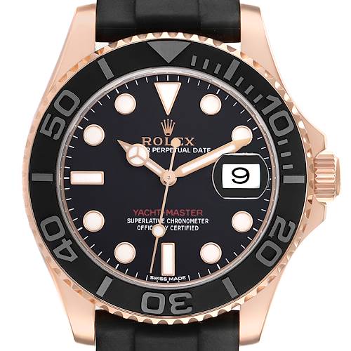 The Rolex Yacht-Master watch is shown from a front angle, displaying the dial, bezel, and part of the strap.