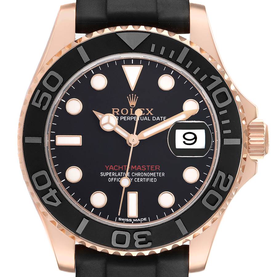 The Rolex Yacht-Master watch is shown from the front, highlighting its dial, bezel, and date window.