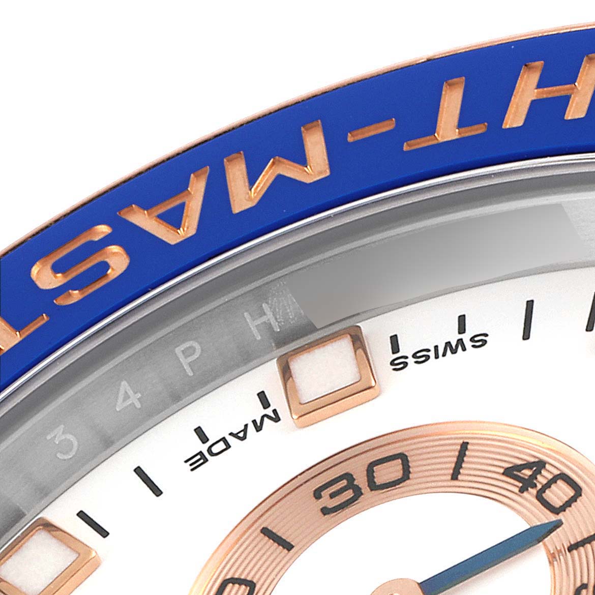 This close-up image shows the bezel and part of the dial of a Rolex Yacht-Master 116681 Men
s Steel and Gold (two tone) White Dial 116681 Men
s Steel and Gold (two tone) White Dial watch.