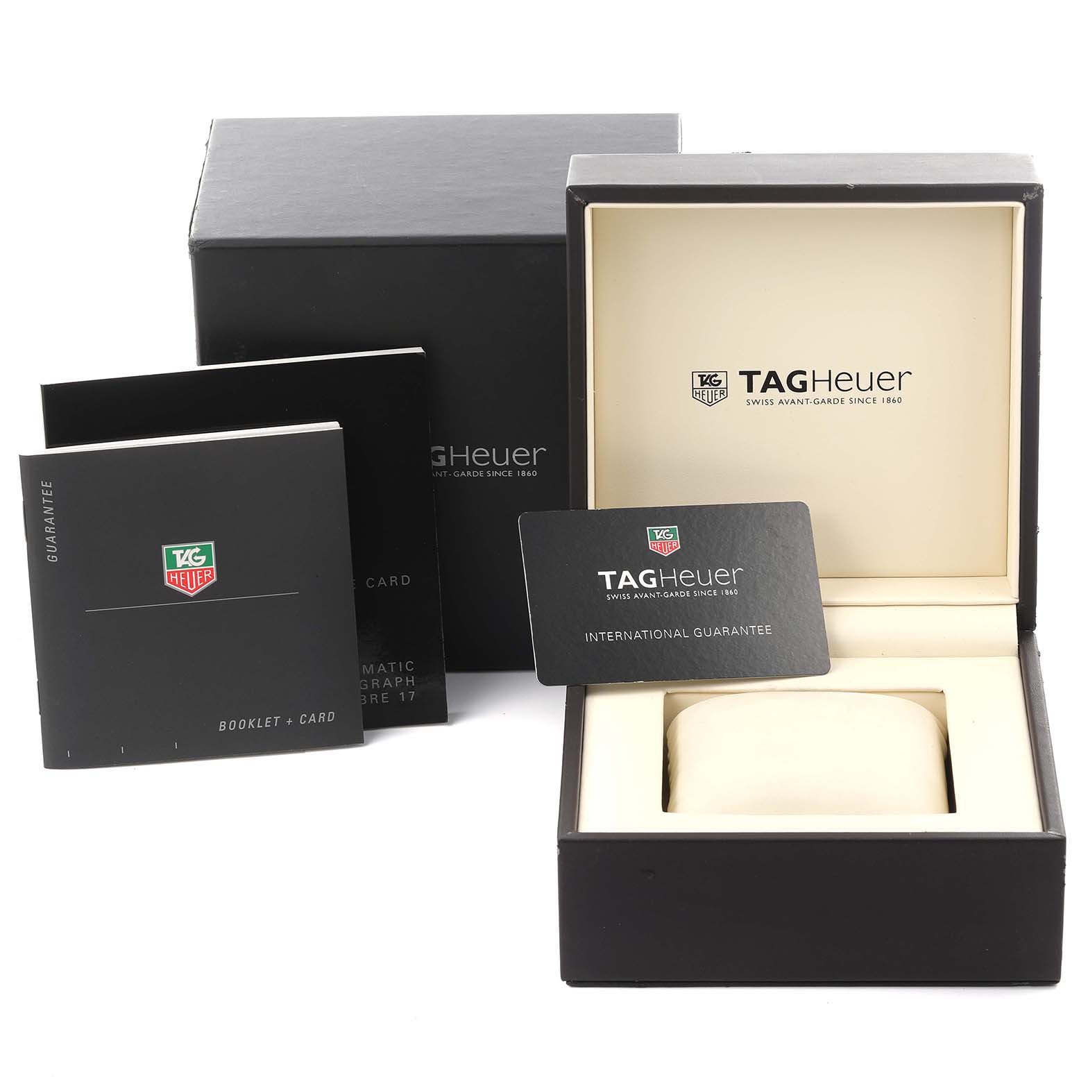 This image shows the Tag Heuer Monaco CW2113.BA0780 Men's Stainless Steel Blue Dial CW2113.BA0780 Men's Stainless Steel Blue Dial watch box, booklet, and international guarantee card.