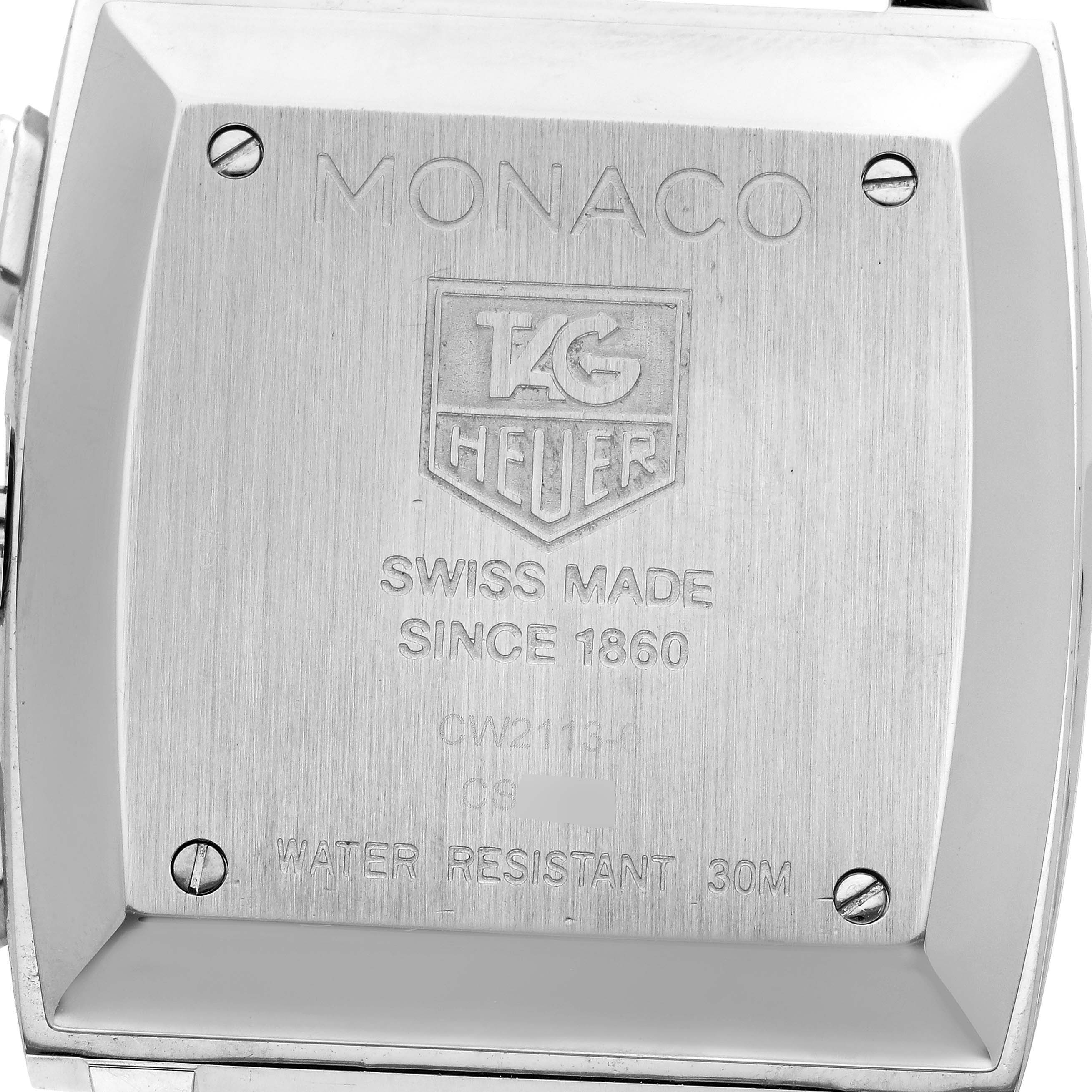 The image shows the back case of the Tag Heuer Monaco CW2113.BA0780 Men's Stainless Steel Blue Dial CW2113.BA0780 Men's Stainless Steel Blue Dial watch, highlighting its branding and specifications.