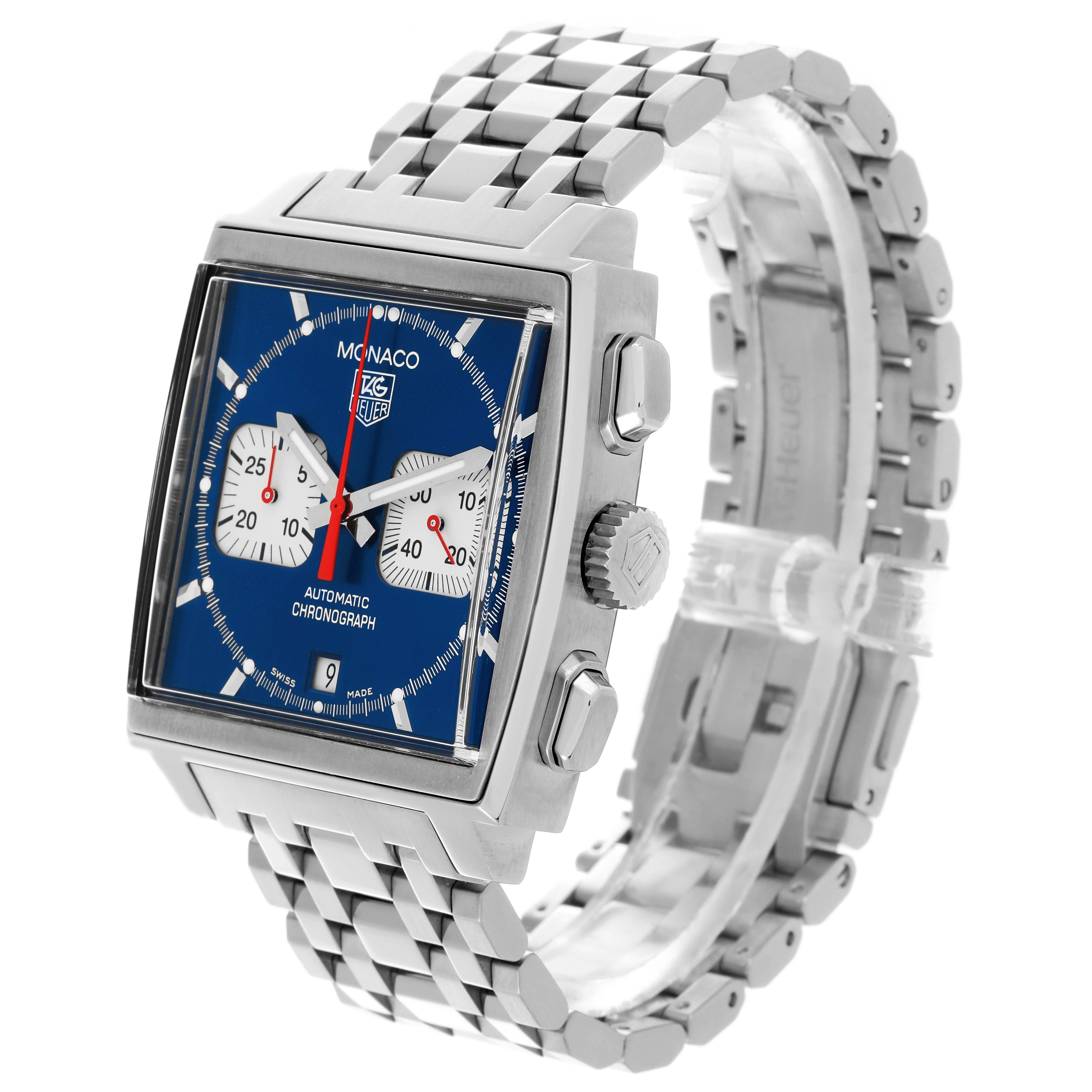 The Tag Heuer Monaco CW2113.BA0780 Men's Stainless Steel Blue Dial CW2113.BA0780 Men's Stainless Steel Blue Dial watch is shown in a side angle displaying the face, case, crown, and bracelet.