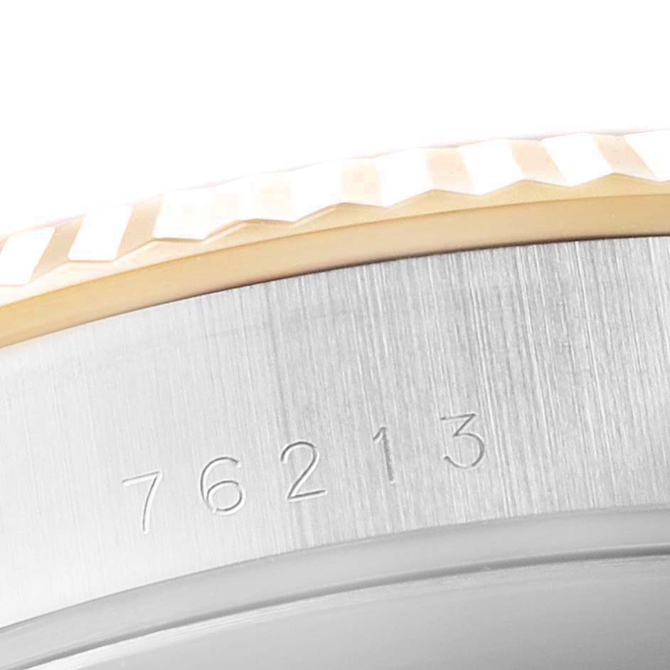 This close-up image of the Tudor Prince 76213 Men's Steel and Gold (two tone) Champagne Dial 76213 Men's Steel and Gold (two tone) Champagne Dial watch model shows part of the bezel and the side of the watch case with the model number engraved.