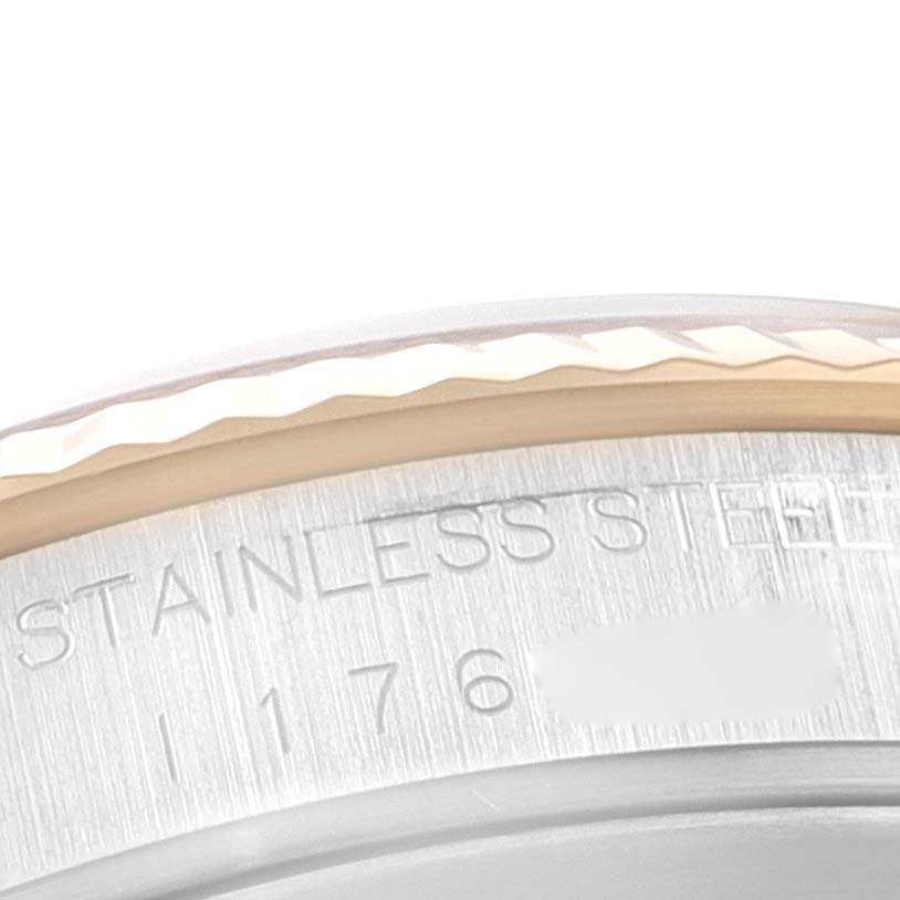 The image shows an angled close-up of the stainless steel case back of the Tudor Prince 76213 Men's Steel and Gold (two tone) Champagne Dial 76213 Men's Steel and Gold (two tone) Champagne Dial watch, highlighting the engraved text.