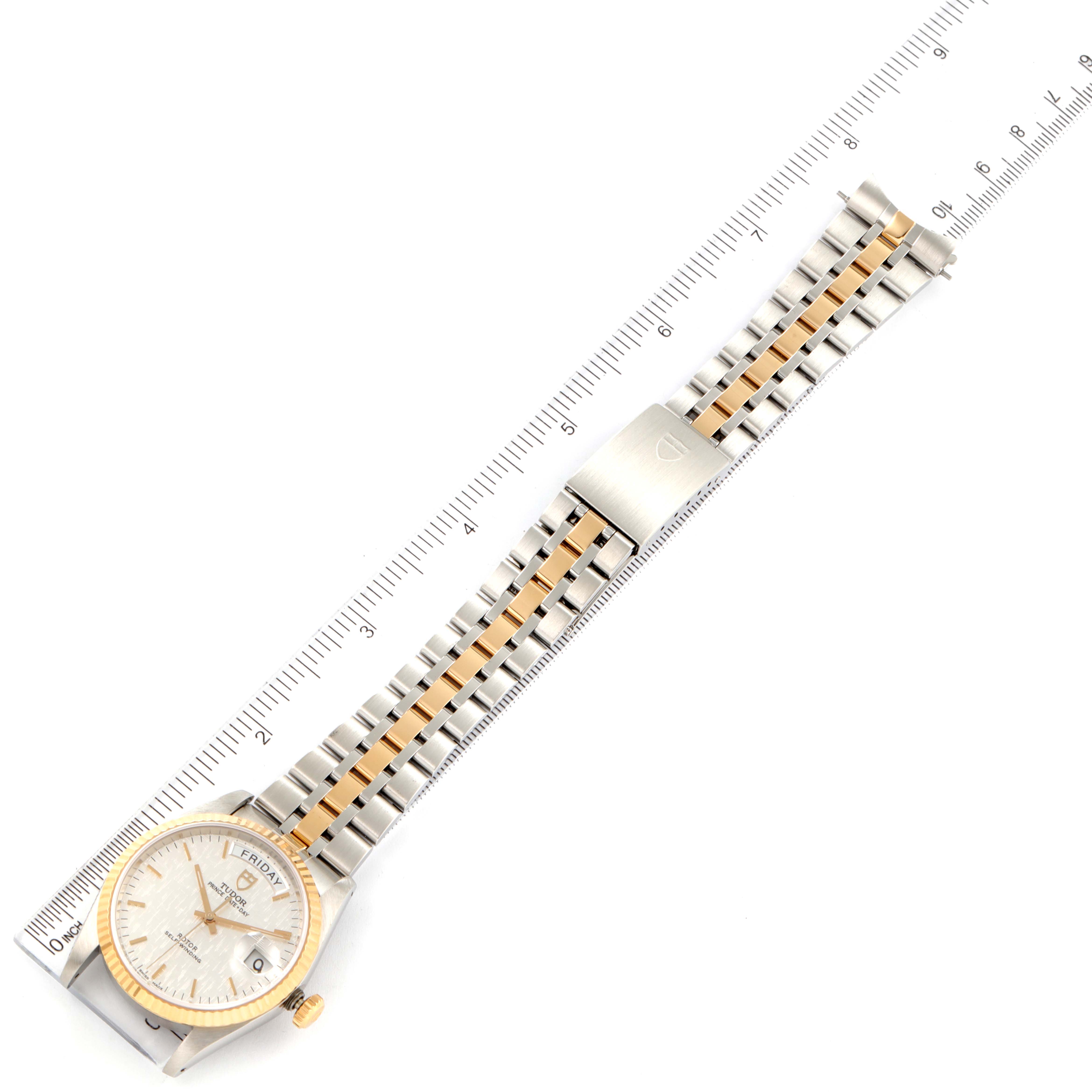 The image shows a Tudor Prince 76213 Men's Steel and Gold (two tone) Silver Dial 76213 Men's Steel and Gold (two tone) Silver Dial watch, displaying the full bracelet, dial, and bezel at an overhead angle.