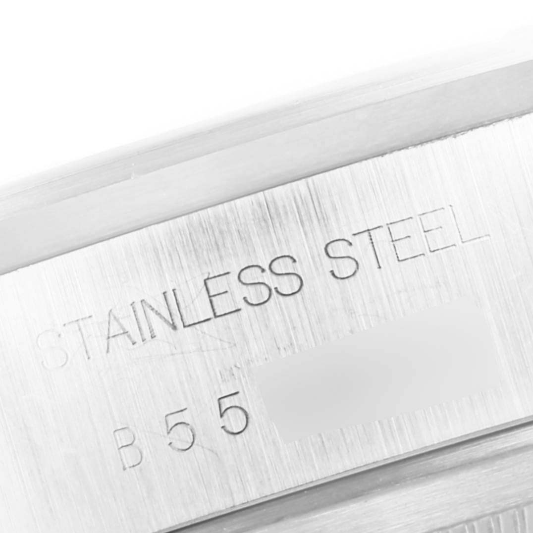 This image shows an engraved section of the case of the Tudor Prince 79180 Men
s Stainless Steel Black Dial 79180 Men
s Stainless Steel Black Dial watch, indicating it is made of stainless steel.