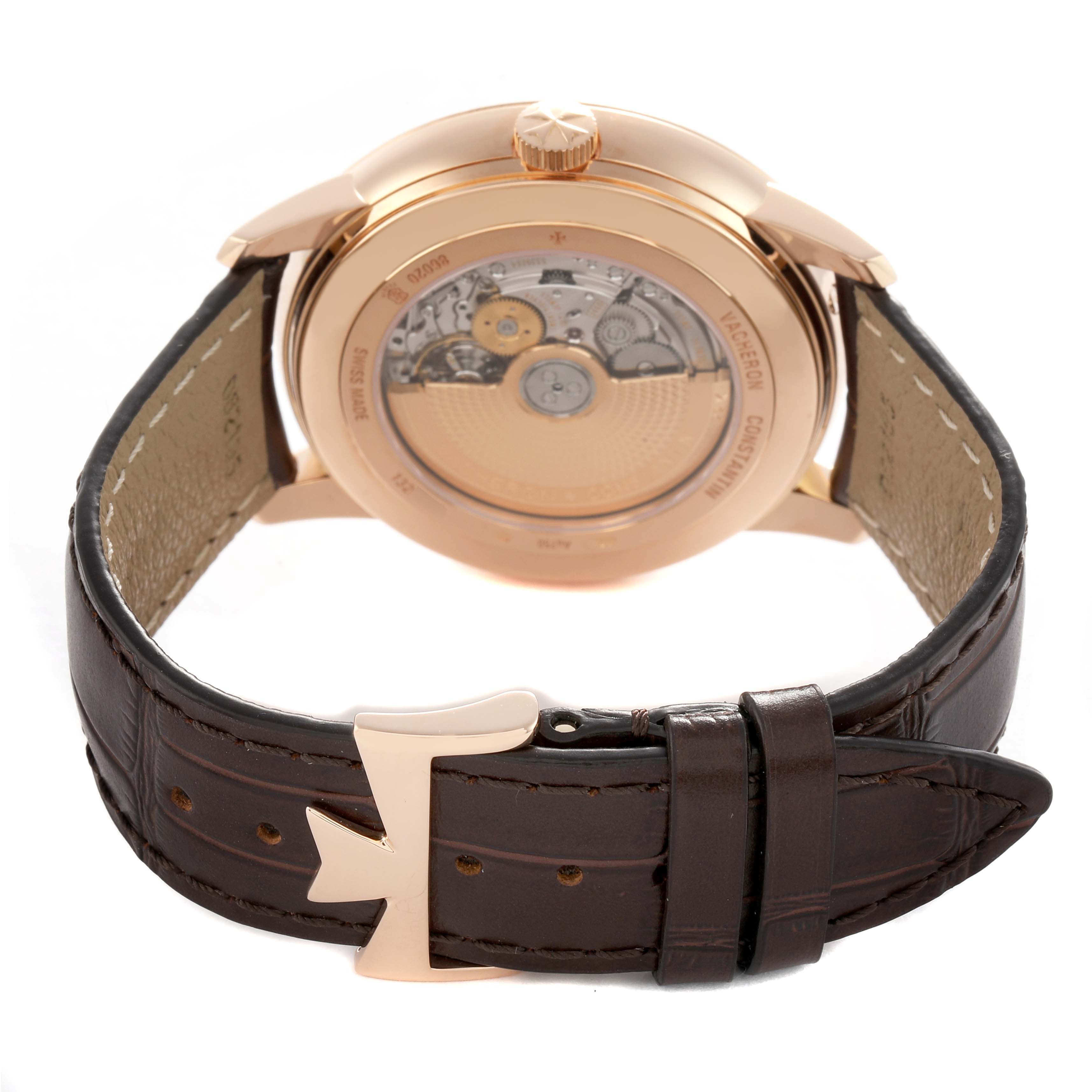 The image shows the back view of a Vacheron Constantin Patrimony 86020 Men's Rose Gold Grey Dial watch, highlighting its movement and leather strap detail.
