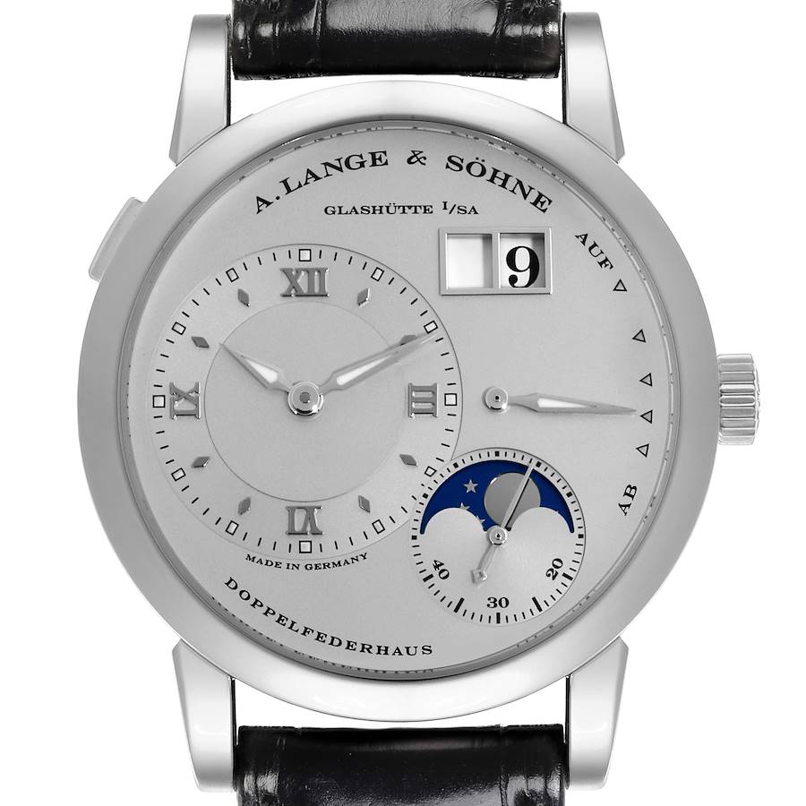 The image shows a front view of the A. Lange & Söhne Lange 1, highlighting the dials and leather strap.