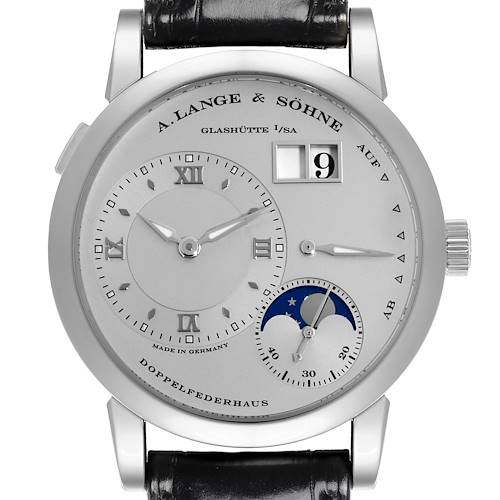 The image shows a front view of the A. Lange & Söhne Lange 1 watch, highlighting the dial, subdials, and date window.