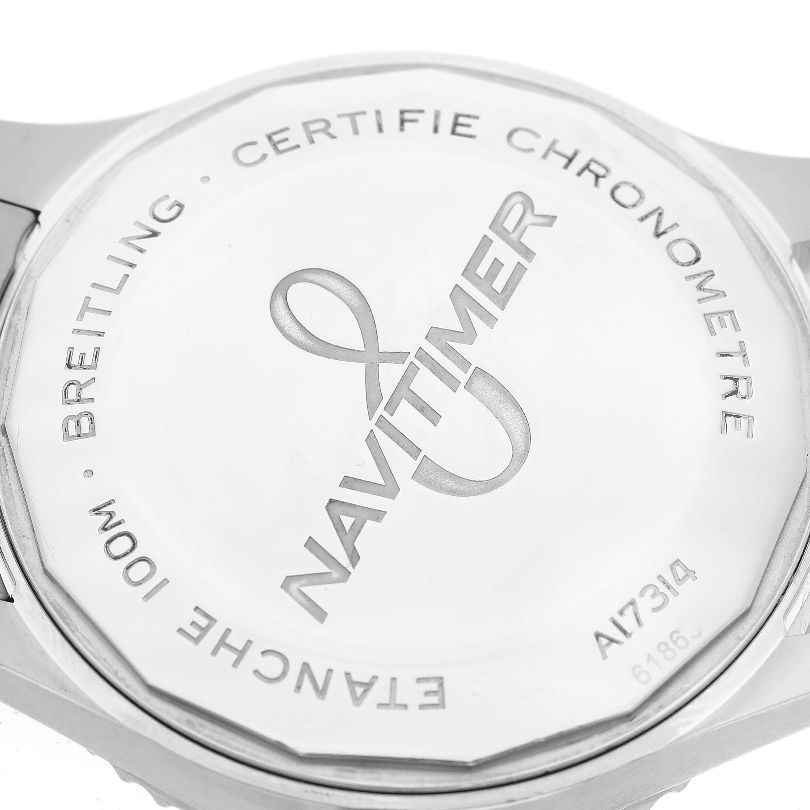 The image shows the back case of a Breitling Navitimer A17314 Men
s Stainless Steel Blue Dial A17314 Men
s Stainless Steel Blue Dial watch, highlighting its engravings and model details.