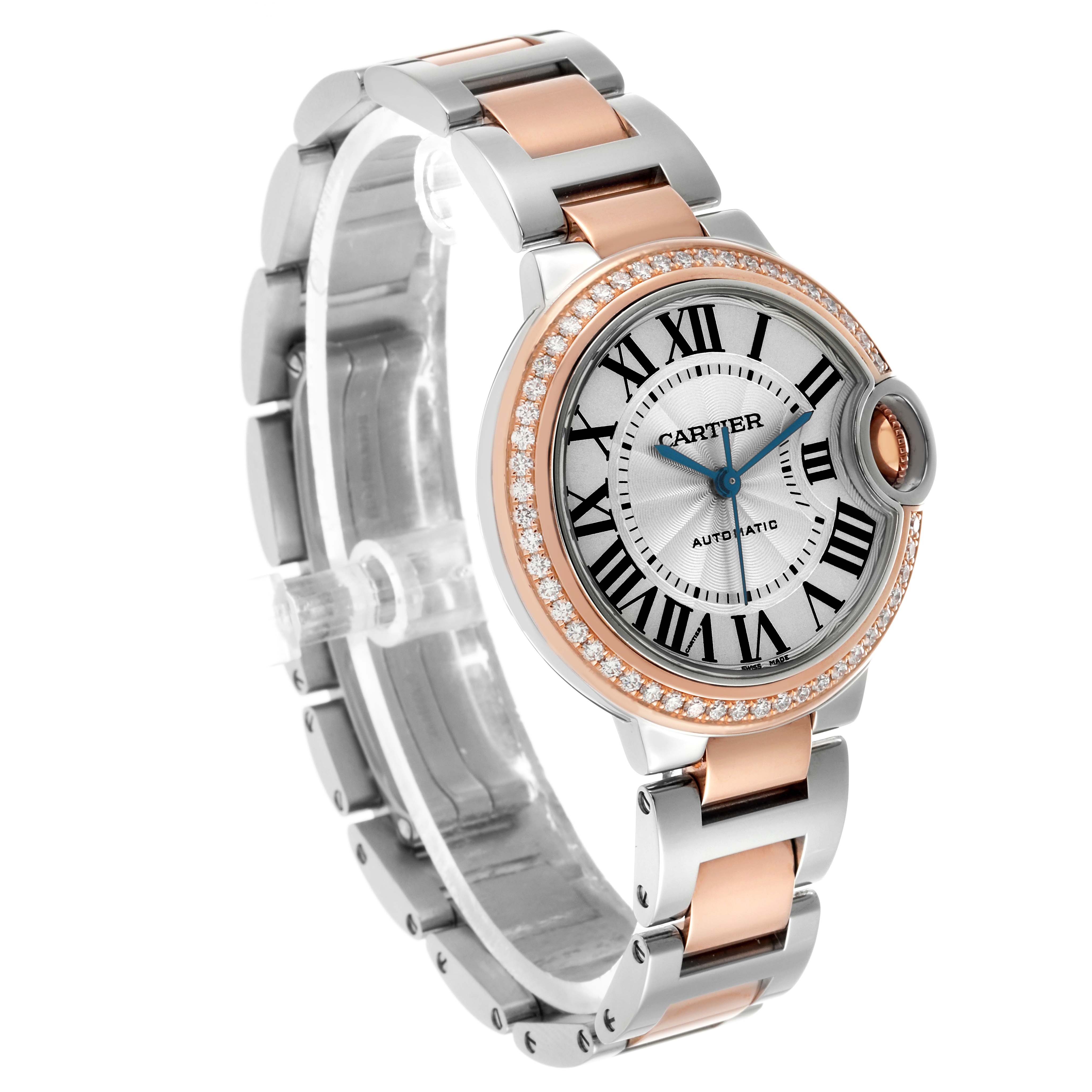 The Cartier Ballon Bleu WE902080 Women's Steel and Gold (two tone) Silver Dial watch is shown at a three-quarter angle displaying its face, bracelet, and diamond bezel.