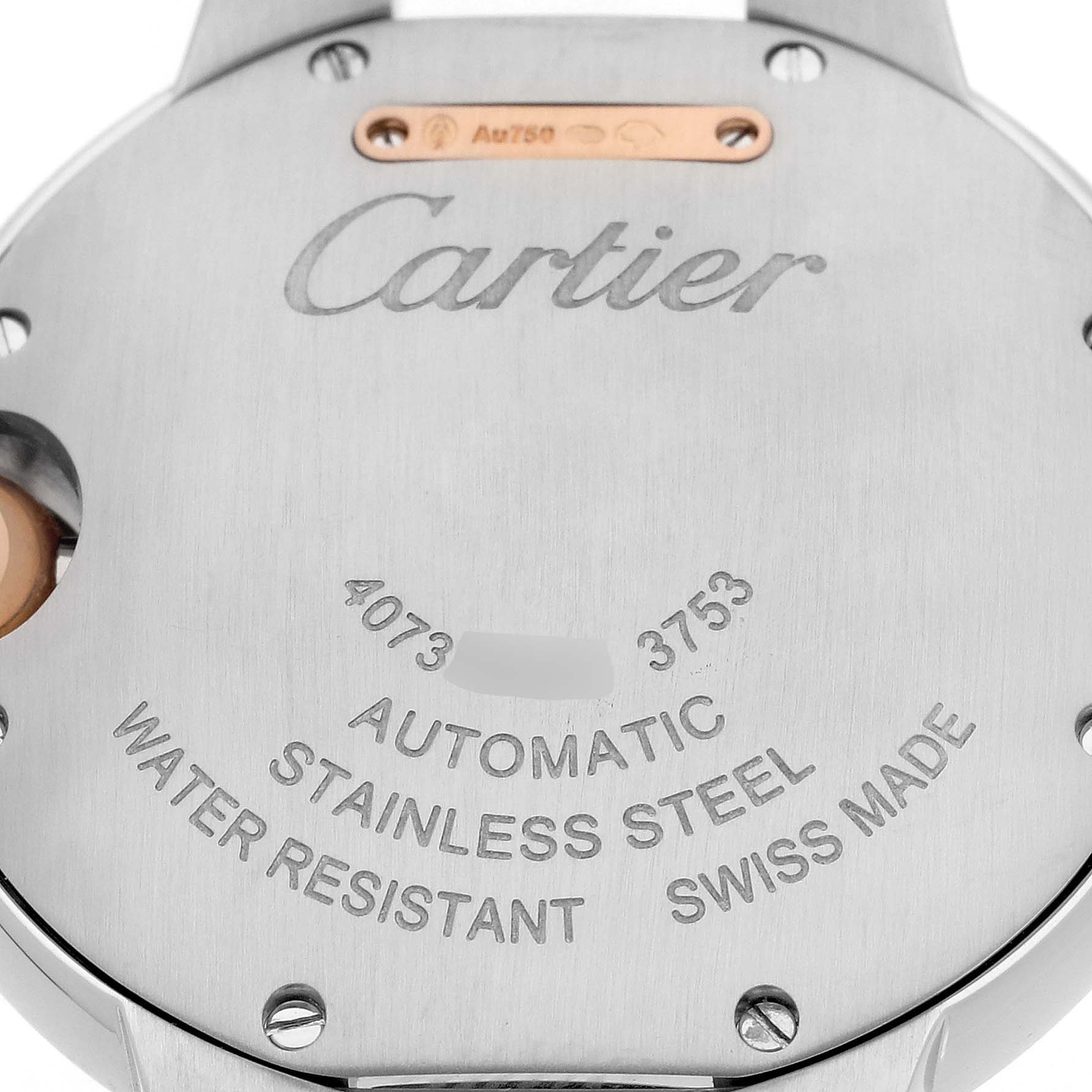 The image shows the back case of a Cartier Ballon Bleu W2BB0023 Women
s Steel and Gold (two tone) Silver Dial W2BB0023 Women
s Steel and Gold (two tone) Silver Dial watch, highlighting brand engravings.