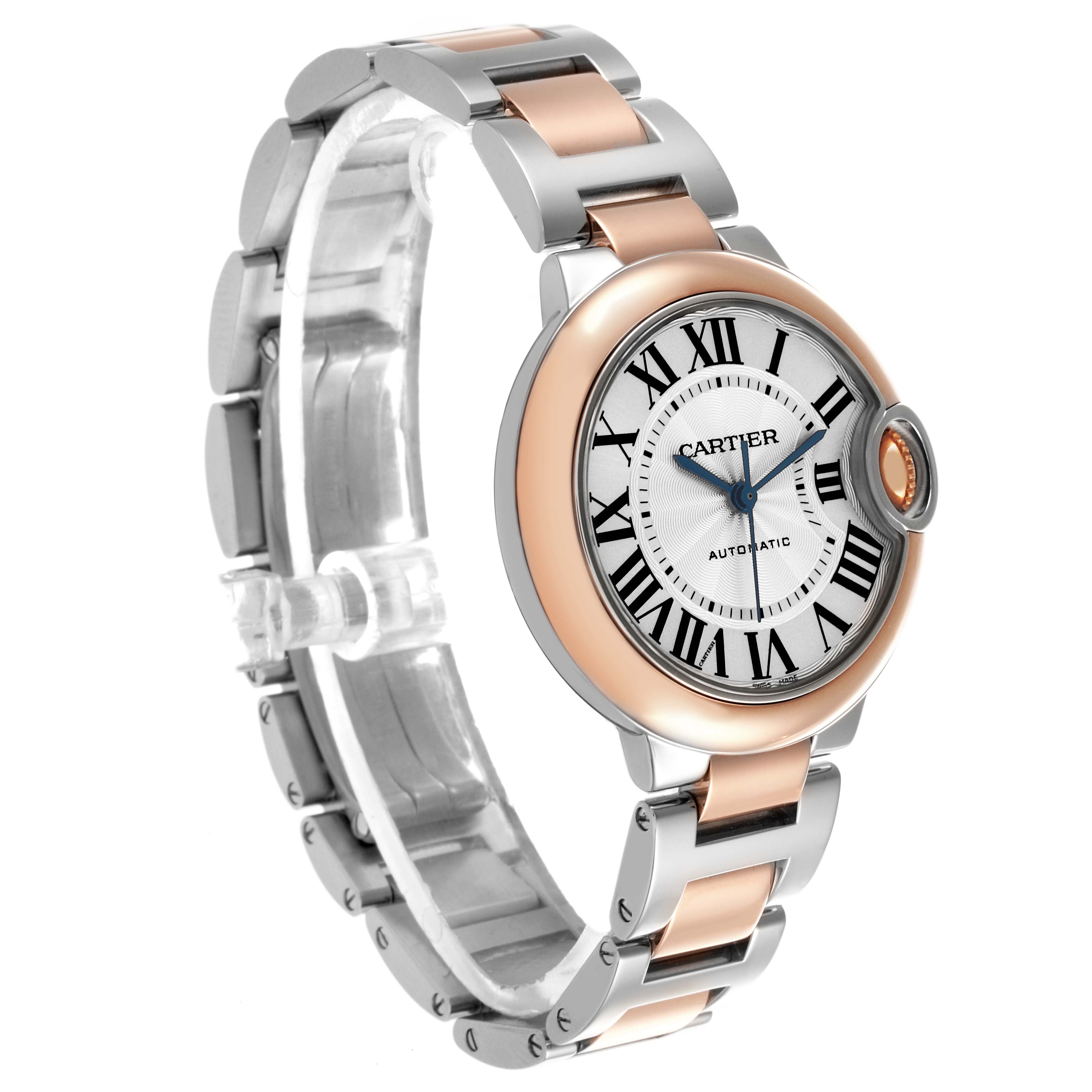 The Cartier Ballon Bleu W2BB0023 Women
s Steel and Gold (two tone) Silver Dial W2BB0023 Women
s Steel and Gold (two tone) Silver Dial watch is shown at a side angle, highlighting its two-tone bracelet and round case with Roman numerals.
