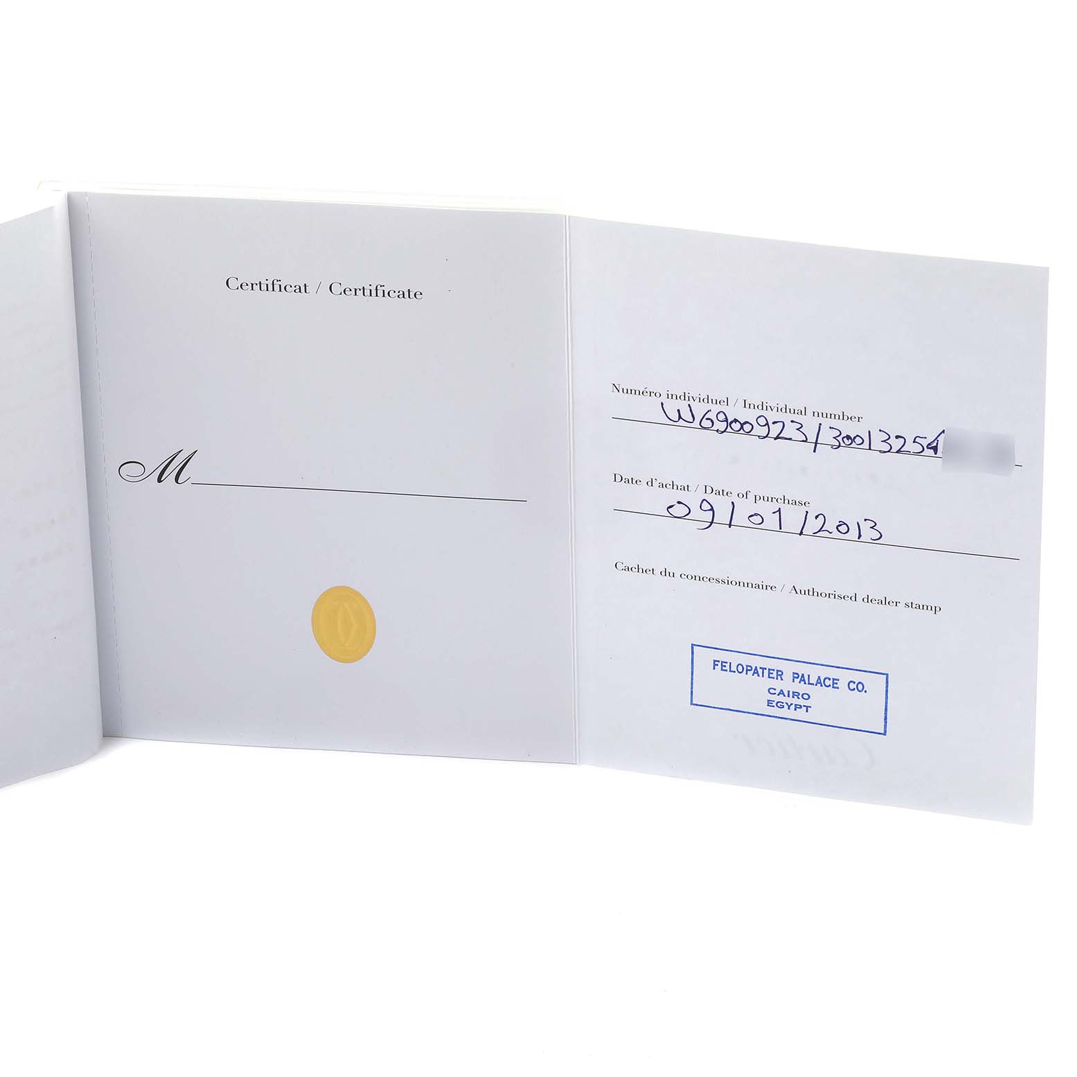 The image shows the certificate for a Cartier Ballon Bleu W69009Z3 Men's Steel and Gold (two tone) Silver Dial W69009Z3 Men's Steel and Gold (two tone) Silver Dial watch, open and displaying purchase information.