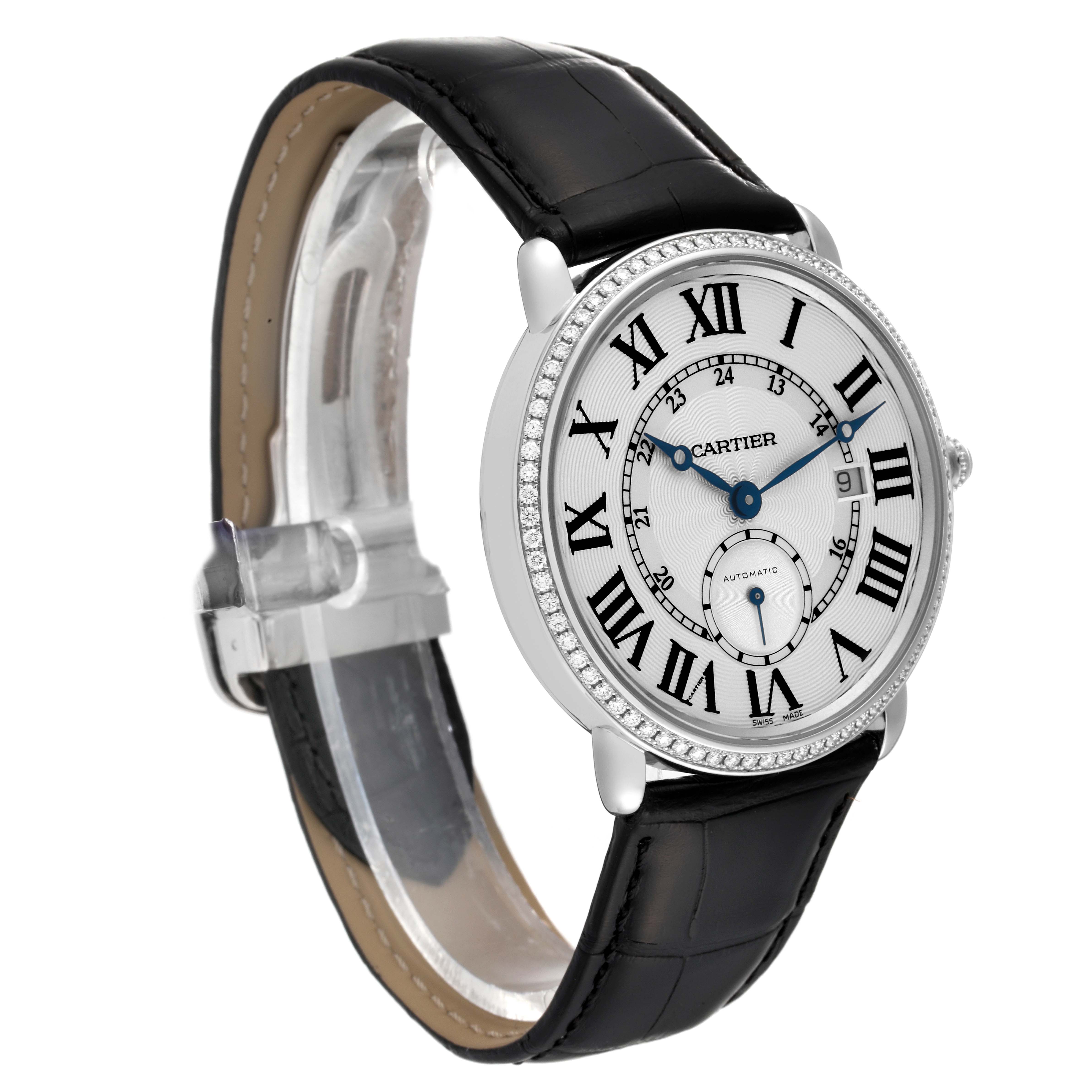 The Cartier Ronde WR007018 Men's White Gold Silver Dial WR007018 Men's White Gold Silver Dial watch is shown at a three-quarter angle displaying its face, bezel, and black leather strap.