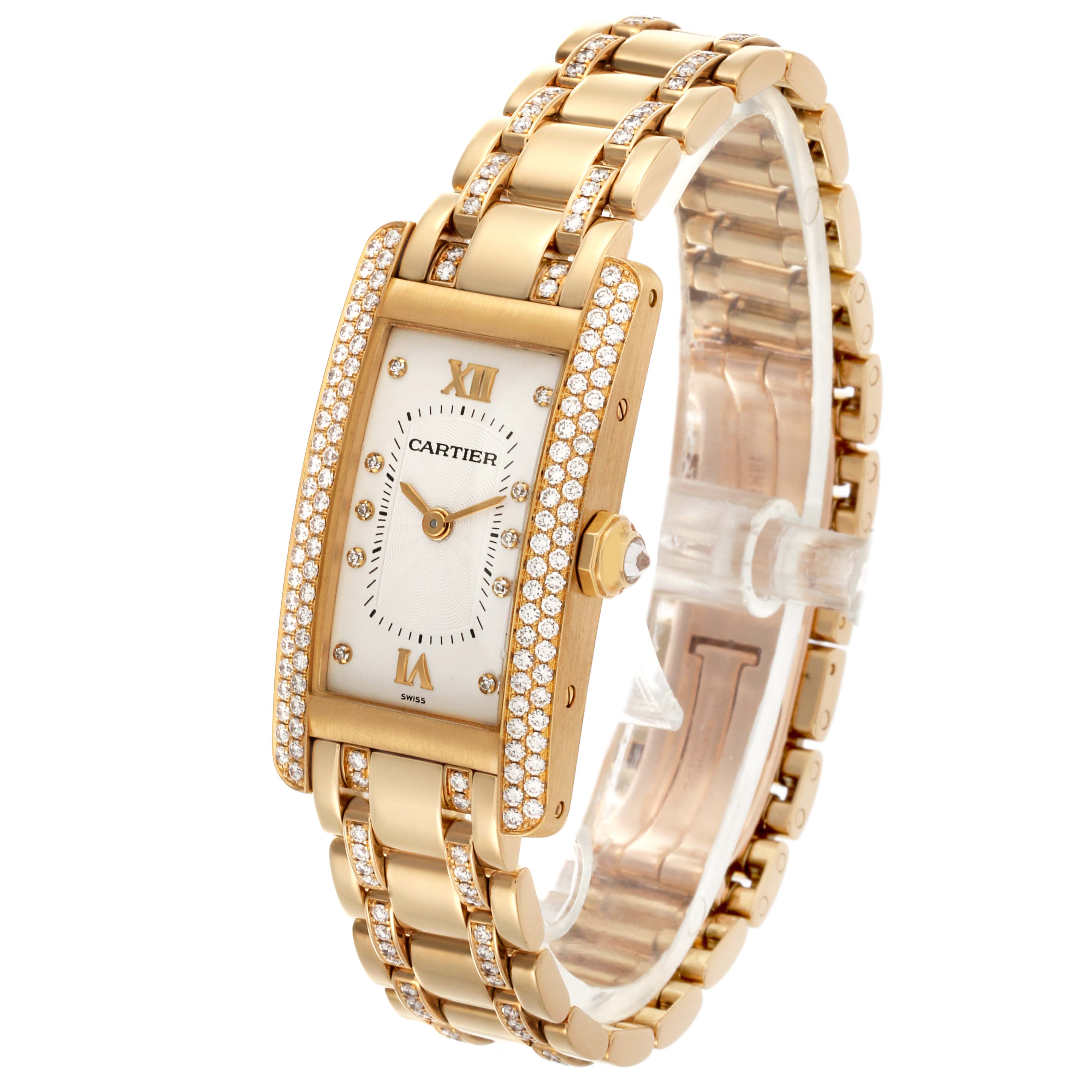 The Cartier Tank Americaine WB7025JL Women's Yellow Gold Silver Dial WB7025JL Women's Yellow Gold Silver Dial watch is shown from an angled perspective, highlighting the bracelet, case, and diamond accents.