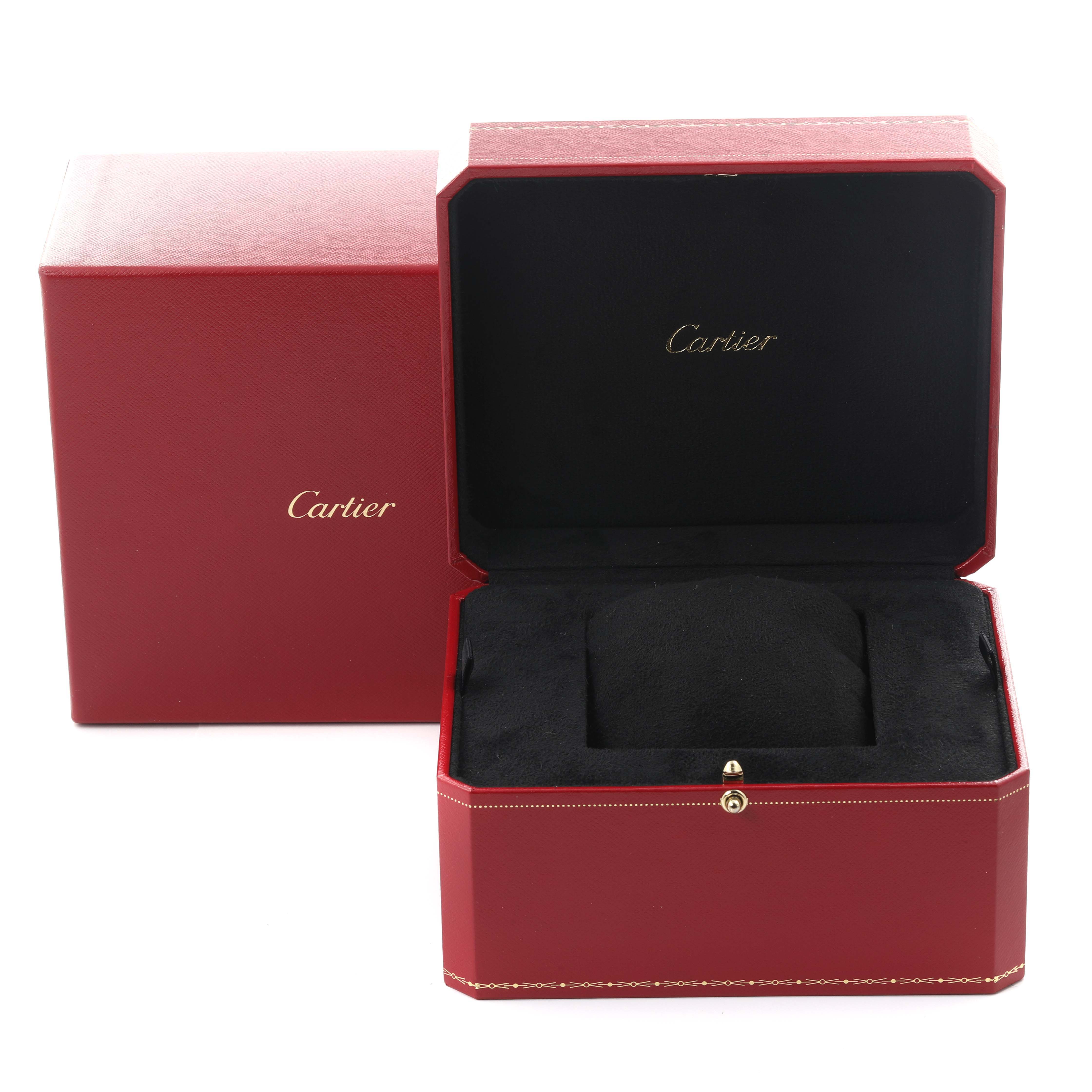The image shows a Cartier Tank Américaine watch box, opened to display its interior with a cushion for the watch.